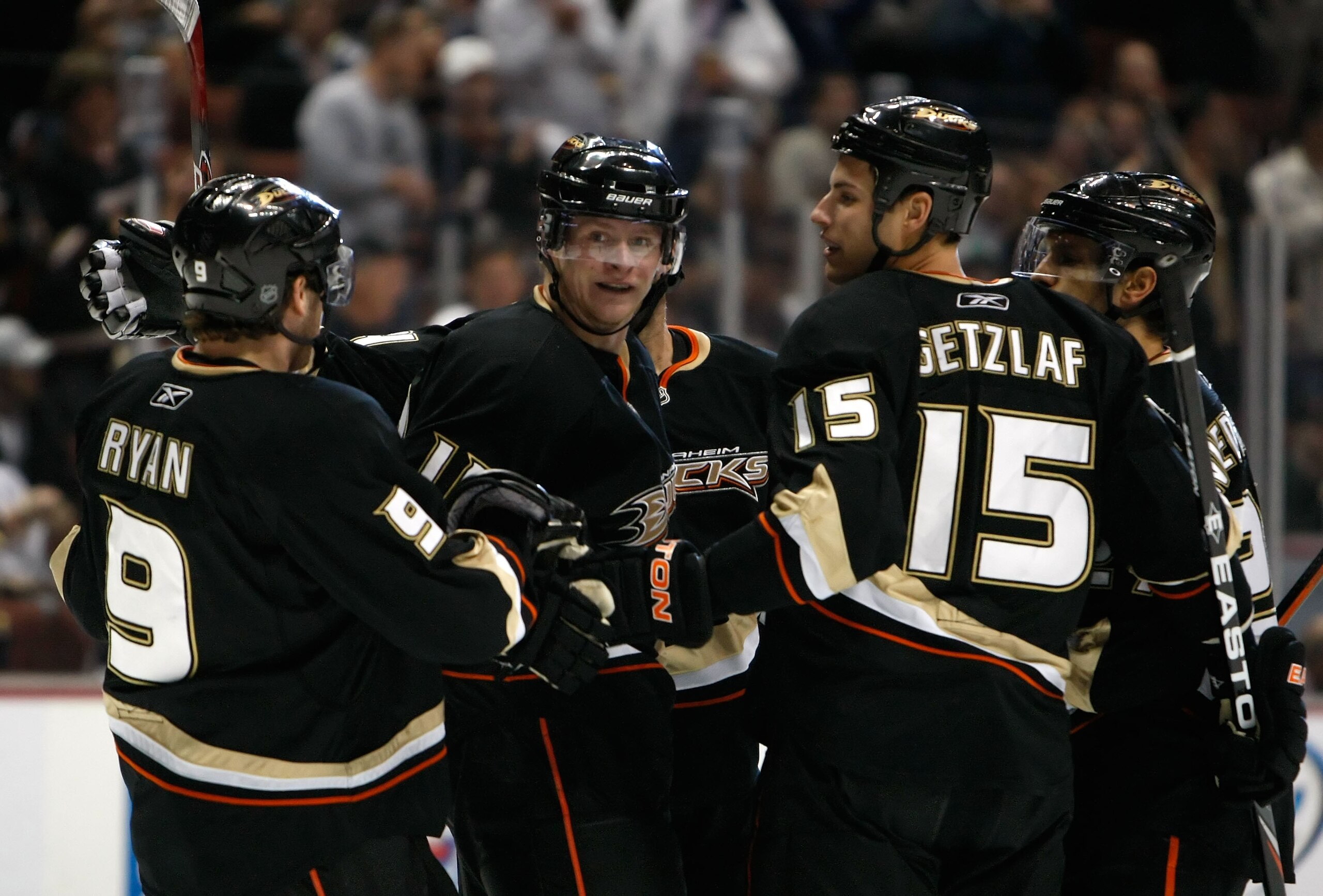 ANAHEIM, CA - NOVEMBER 03:  (L-R) Bobby Ryan #9, Corey Perry #10, Ryan Getzlaf #15  and Scott Niedermayer #27 of the Anaheim Ducks celebrate Perry's first-period goal against the Pittsburgh Penguins at the Honda Center on November 3, 2009 in Anaheim, Cali
