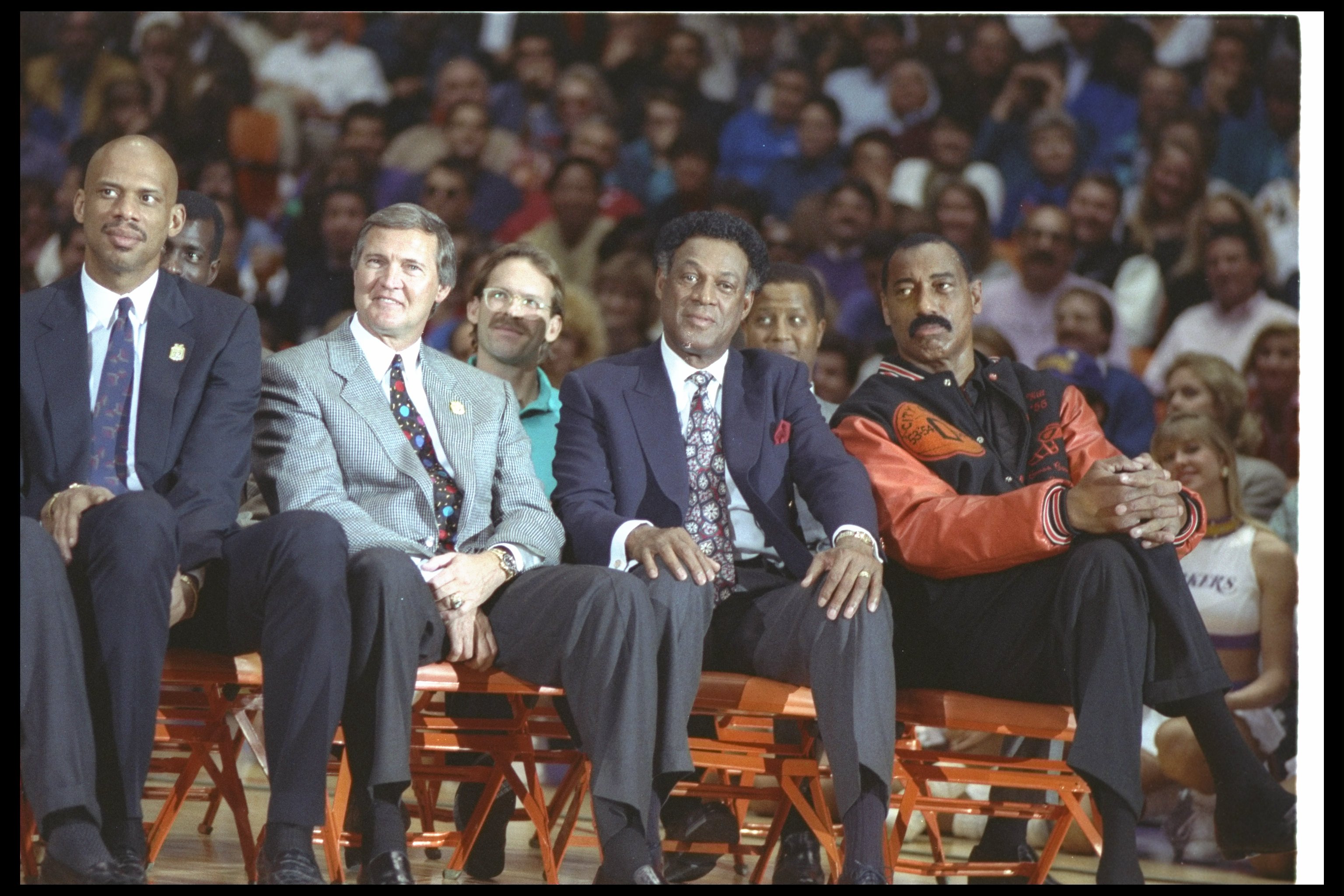 INGLEWOOD, CA - FEBRUARY 16:  Kareem Abdul-Jabbar, Jerry West, Elgin Baylor and Wilt Chamberlain sit on the court during Earvin 'Magic' Johnson's retirement ceremony from the Los Angeles Lakers on February 16, 1992 at the Great Western Forum in Inglewood,
