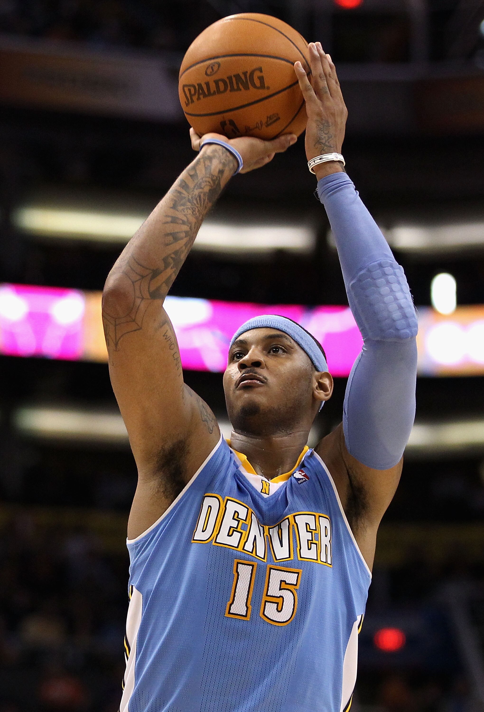 PHOENIX - NOVEMBER 15:  Carmelo Anthony #15 of the Denver Nuggets shoots a free throw shot during the NBA game against the Phoenix Suns at US Airways Center on November 15, 2010 in Phoenix, Arizona.  The Suns defeated the Nuggets 100-94.  NOTE TO USER: Us