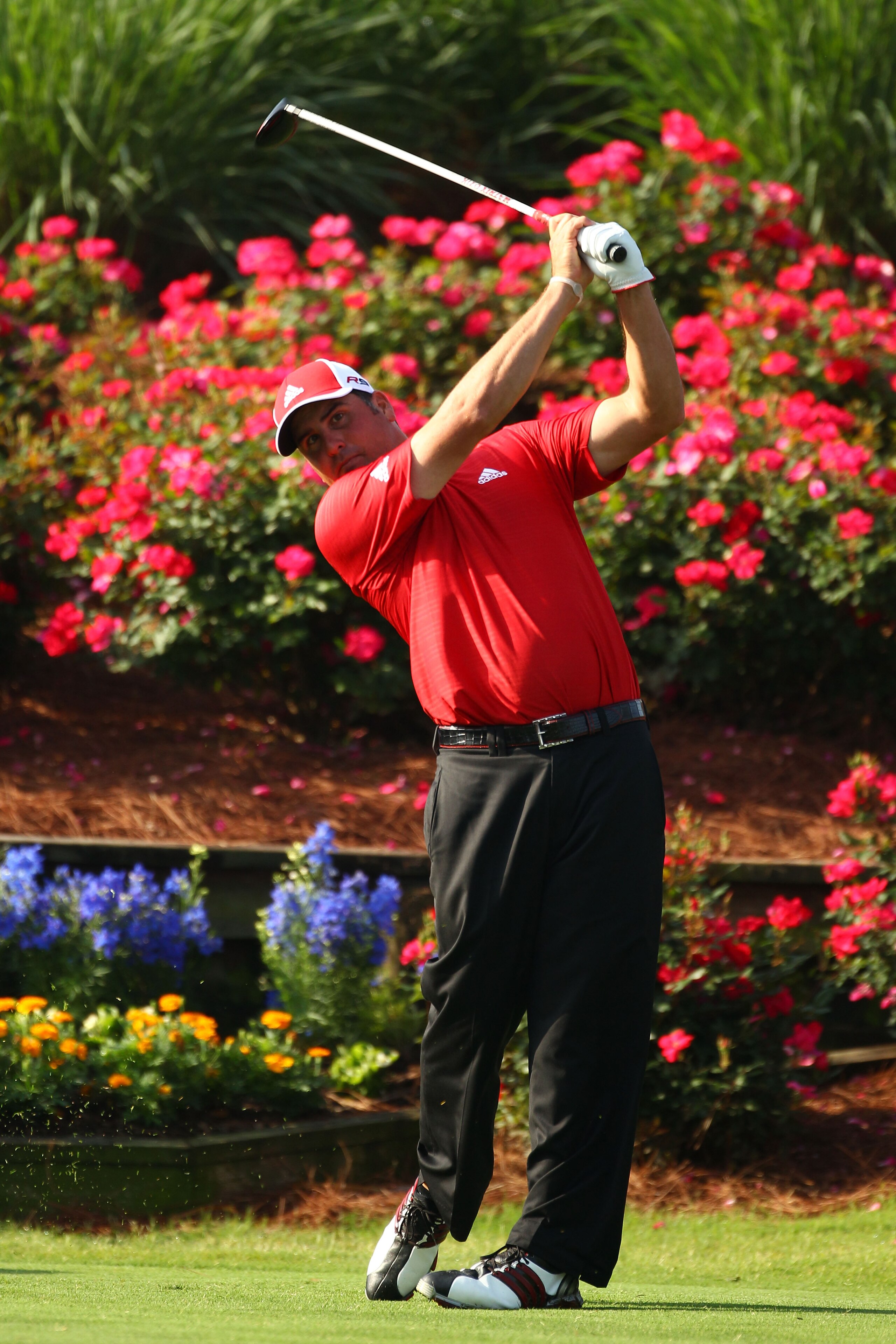 PONTE VEDRA BEACH, FL - MAY 04:  Pat Perez hits a tee shot during a practice round prior to the start of THE PLAYERS Championship held at THE PLAYERS Stadium course at TPC Sawgrass on May 4, 2010 in Ponte Vedra Beach, Florida.  (Photo by Richard Heathcote