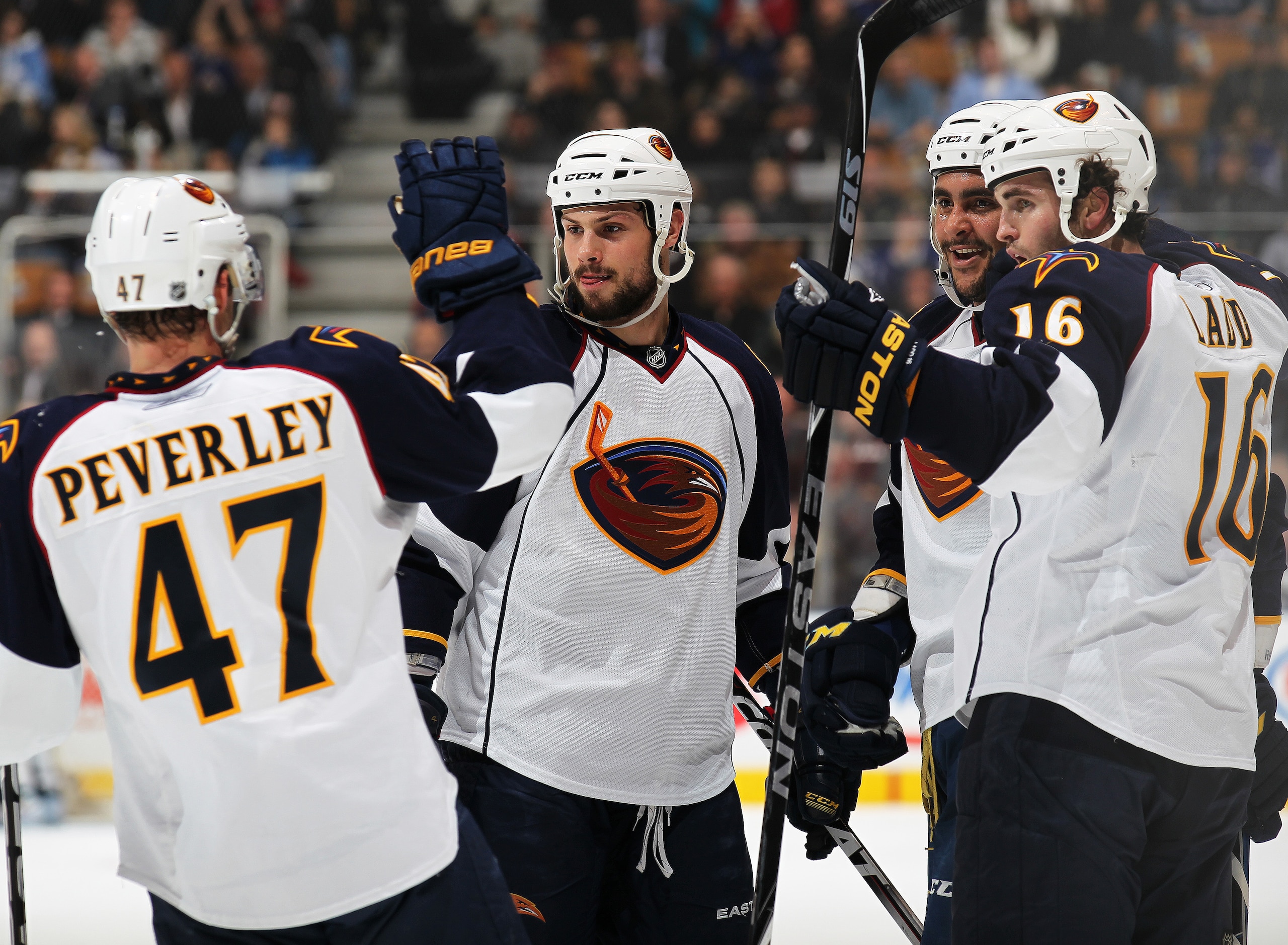 TORONTO, CAN - FEBRUARY 7:  Dustin Byfuglien #33 of the Atlanta Thrashers celebrates his goal with teammates Rich Peverley #47, Zach Bogosian #4, and Andrew Ladd #16 in a game against the Toronto Maple Leafs on February 7, 2011 at the Air Canada Centre in