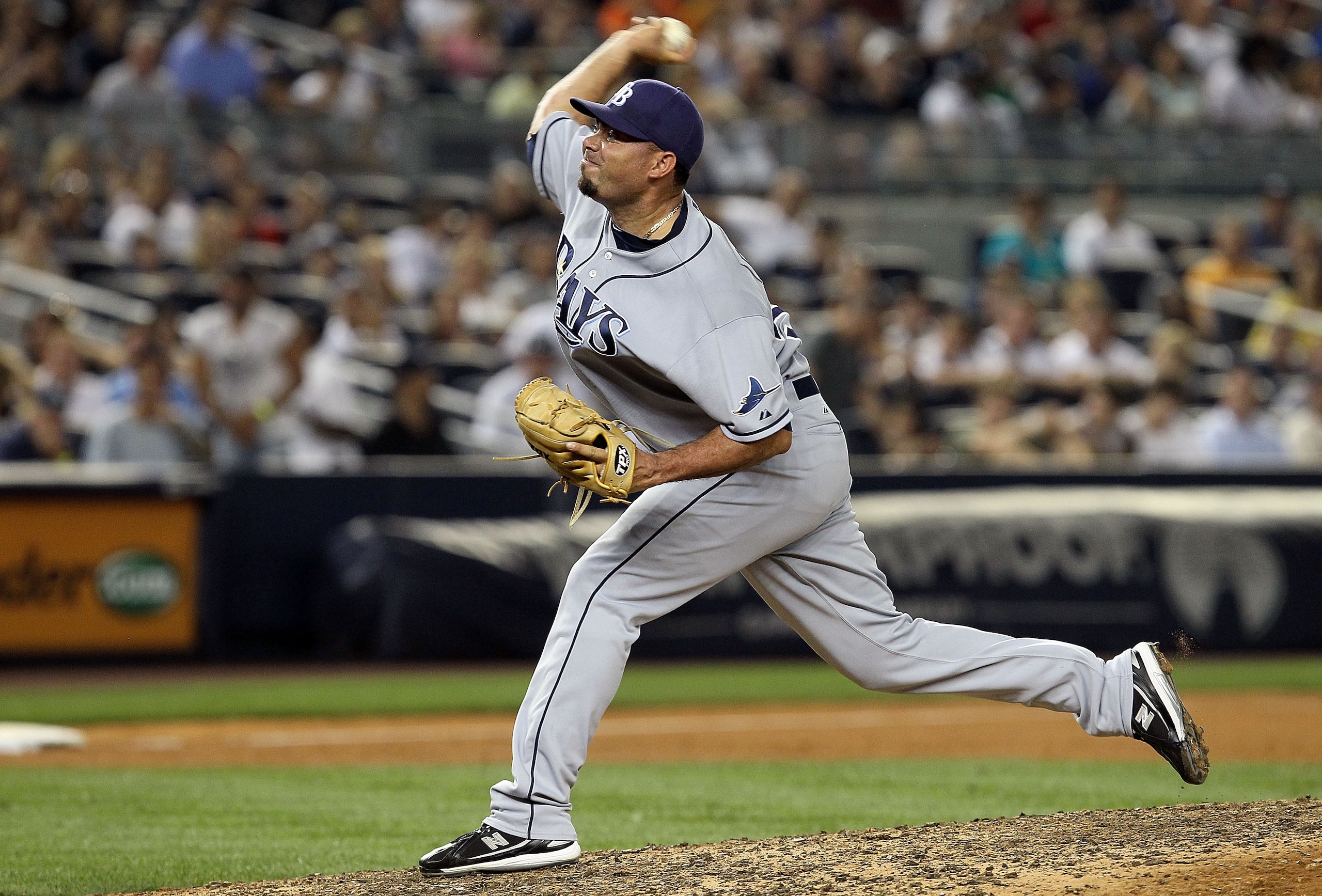 NEW YORK - JULY 16:  Joaquin Benoit #53 of the Tampa Bay Rays pitches against the New York Yankees on July 16, 2010 at Yankee Stadium in the Bronx borough of New York City. The Yankees defeated the Rays 5-4.  (Photo by Jim McIsaac/Getty Images)