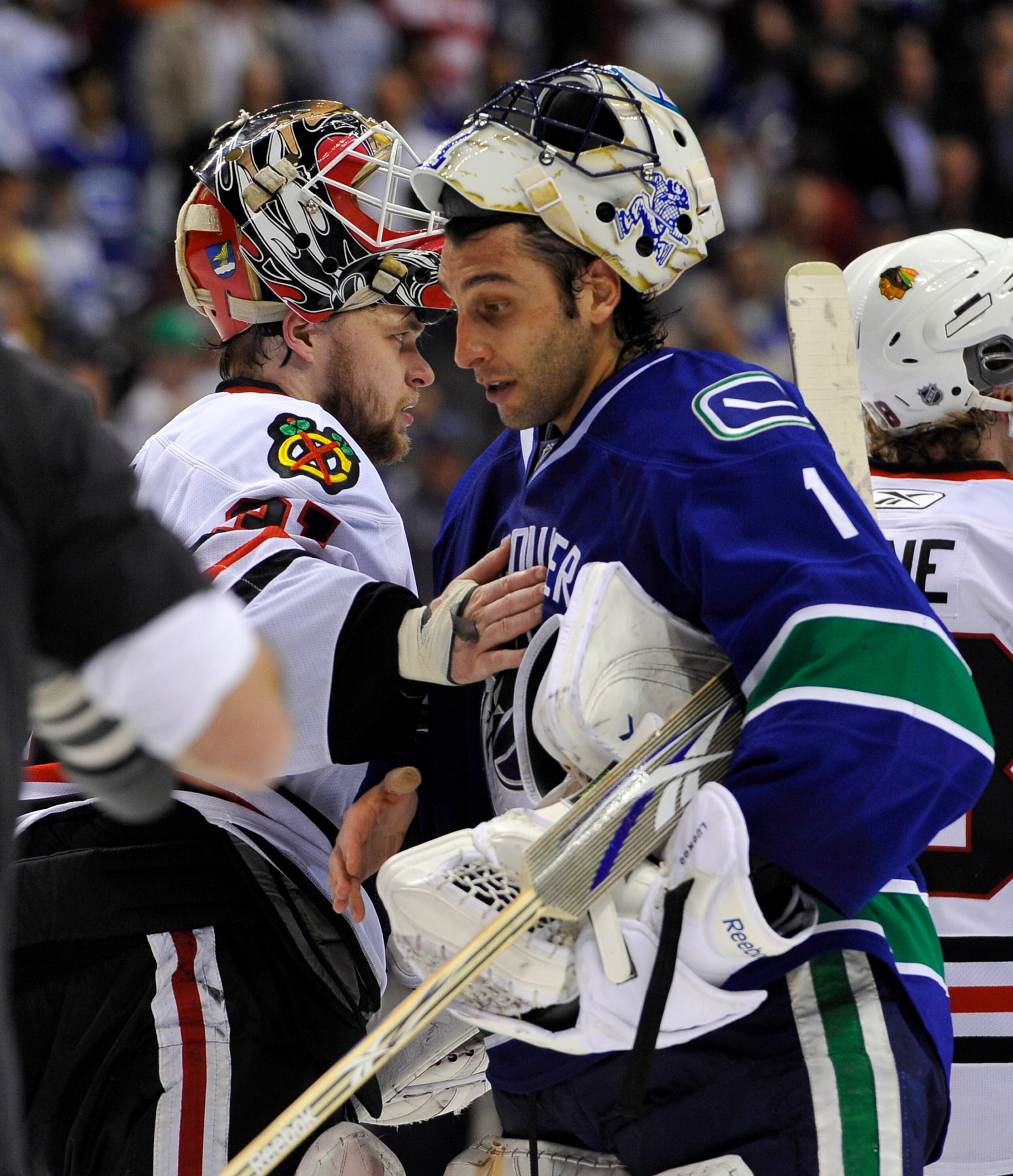 VANCOUVER, CANADA - MAY 11: Goalie Roberto Luongo #1 of the Vancouver Canucks and goalie Antti Niemi #31 of the Chicago Blackhawks shake hands after the Blackhawks defeated the Canucks 5-1 to win Game Six of the Western Conference Semifinals to win the s VANCOUVER, CANADA - MAY 11: Goalie Roberto Luongo #1 of the Vancouver Canucks and goalie Antti Niemi #31 of the Chicago Blackhawks shake hands after the Blackhawks defeated the Canucks 5-1 to win Game Six of the Western Conference Semifinals to win the s