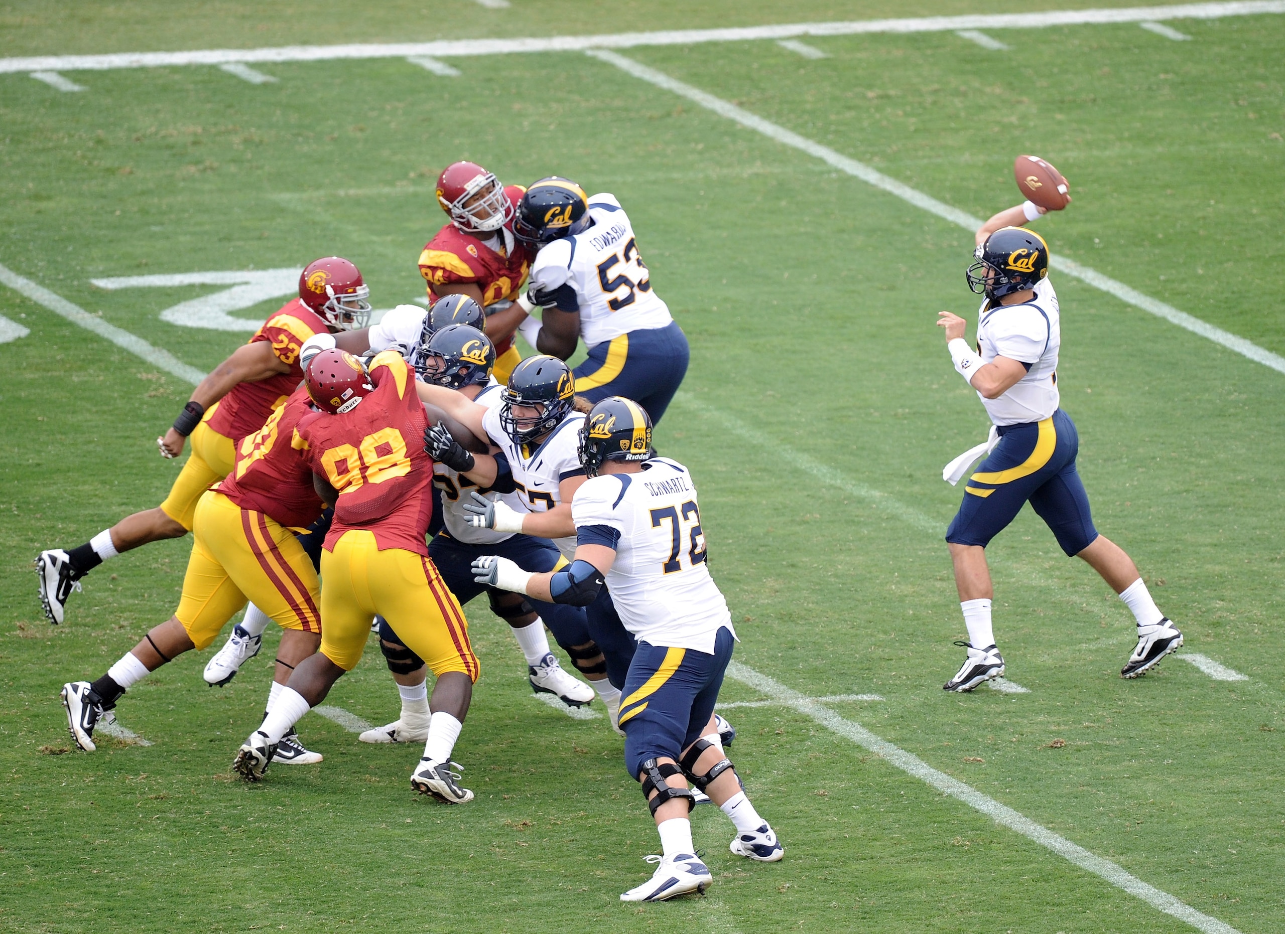 LOS ANGELES, CA - OCTOBER 16:  Kevin Riley #13 of the California Golden Bears passes against the USC Trojans at Los Angeles Memorial Coliseum on October 16, 2010 in Los Angeles, California.  (Photo by Harry How/Getty Images)