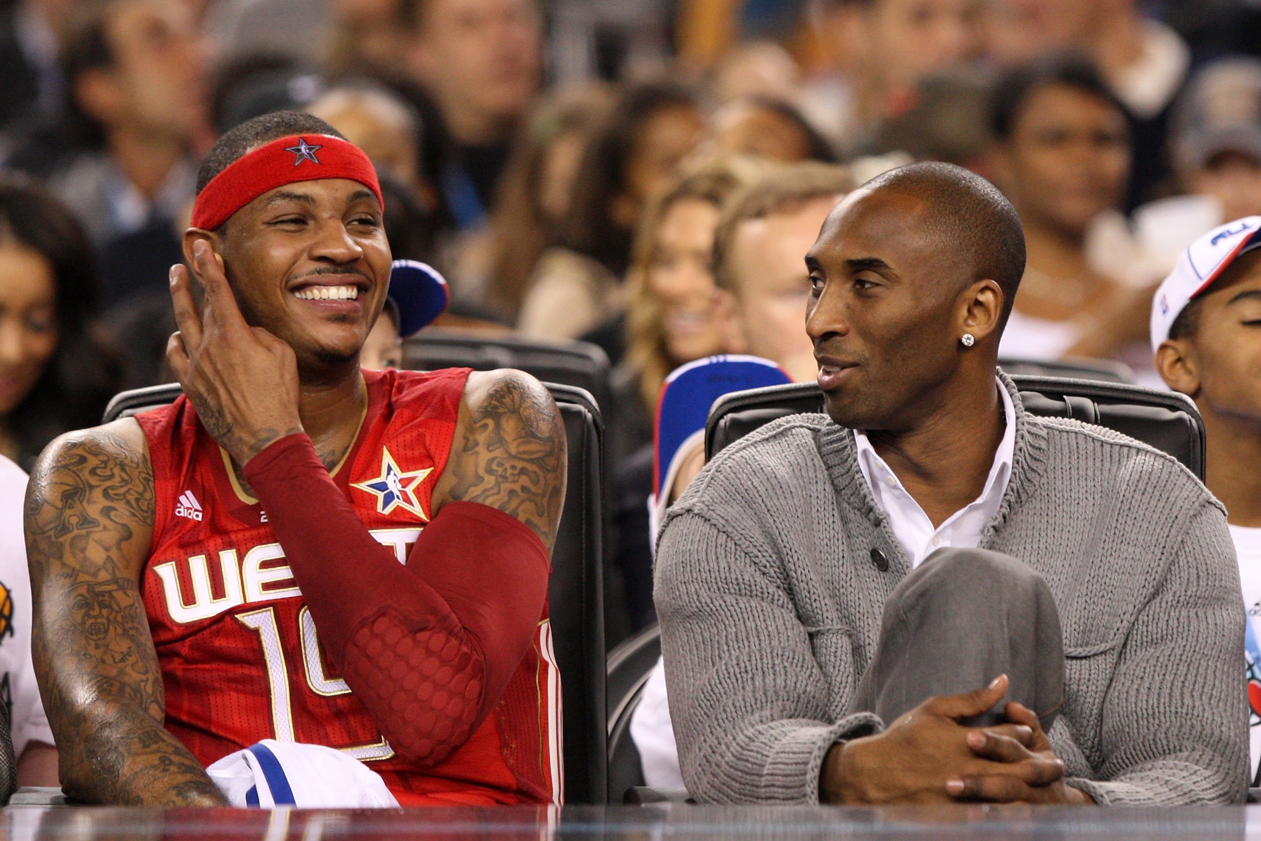 ARLINGTON, TX - FEBRUARY 14:  (L-R) Carmelo Anthony #15 and Kobe Bryant #24 of the Western Conference share a laugh during the NBA All-Star Game, part of 2010 NBA All-Star Weekend at Cowboys Stadium on February 14, 2010 in Arlington, Texas. The Eastern Co