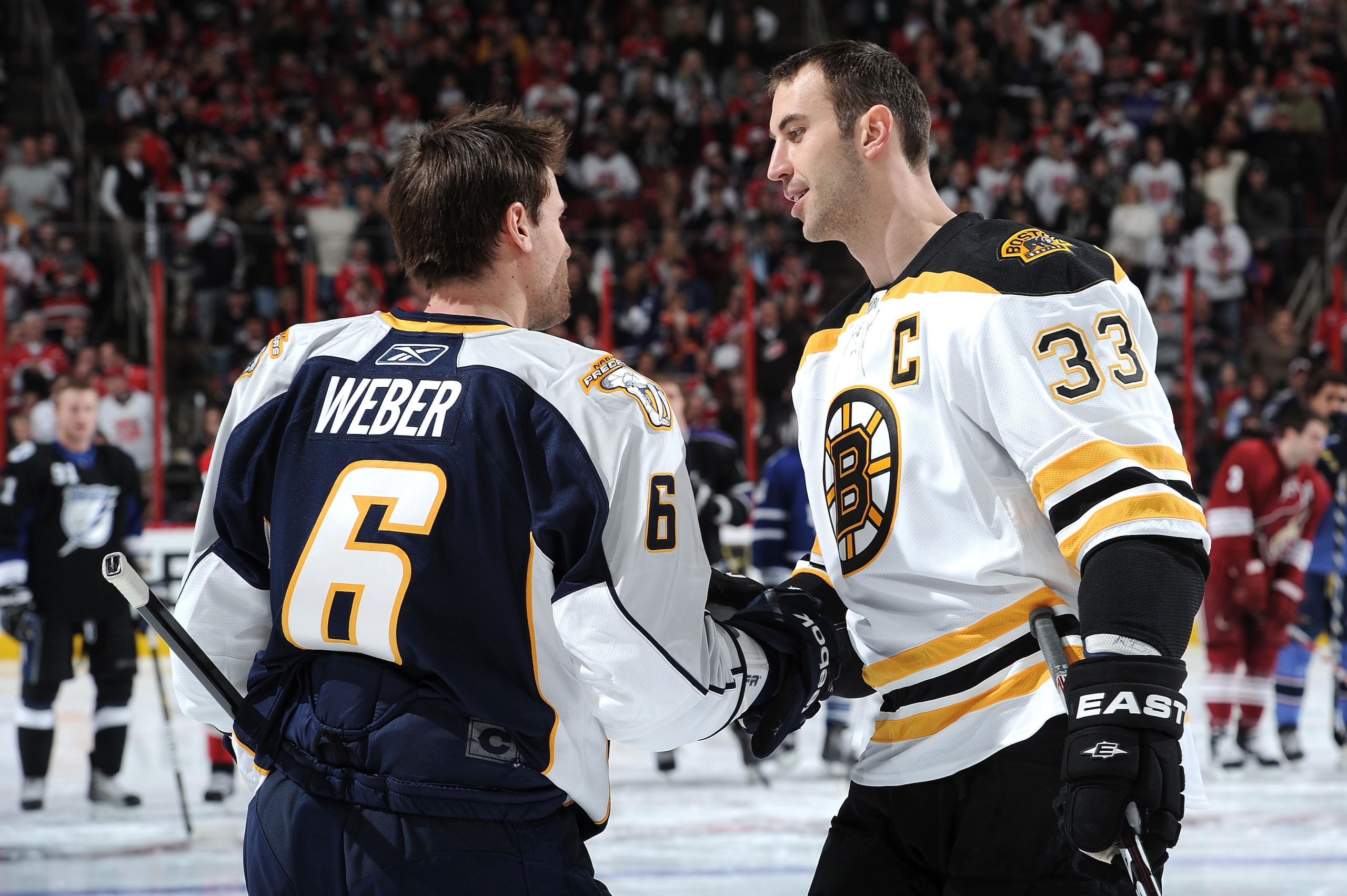 RALEIGH, NC - JANUARY 29: Zdeno Chara #33 of the Boston Bruins is congratulated by Shea Weber #6 of the Nashville Predators during the Honda NHL SuperSkills competition part of 2011 NHL All-Star Weekend at the RBC Center on January 29, 2011 in Raleigh, N RALEIGH, NC - JANUARY 29: Zdeno Chara #33 of the Boston Bruins is congratulated by Shea Weber #6 of the Nashville Predators during the Honda NHL SuperSkills competition part of 2011 NHL All-Star Weekend at the RBC Center on January 29, 2011 in Raleigh, N