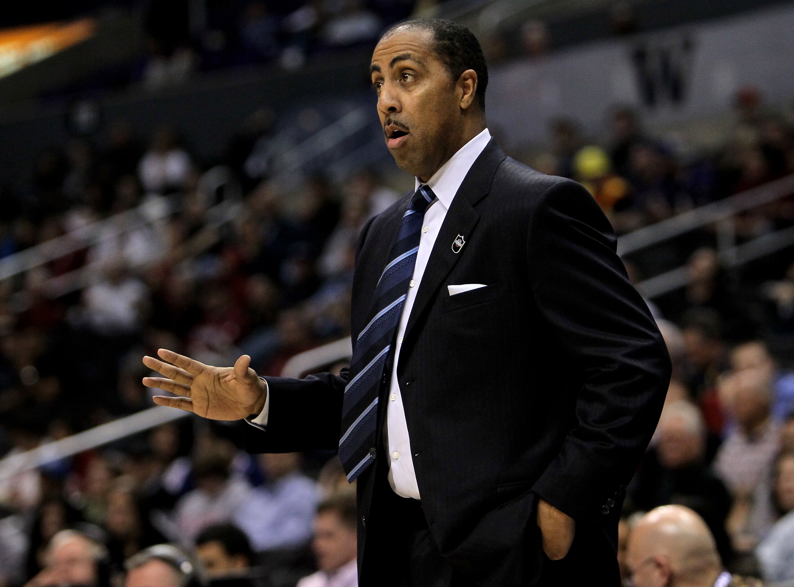 LOS ANGELES, CA - MARCH 12: Head coach Lorenzo Romar of the Washington Huskies gives instructions in the game with the Stanford Cardinal during the semifinals of the Pac-10 Basketball Tournament at Staples Center on March 12, 2010 in Los Angeles, Californ
