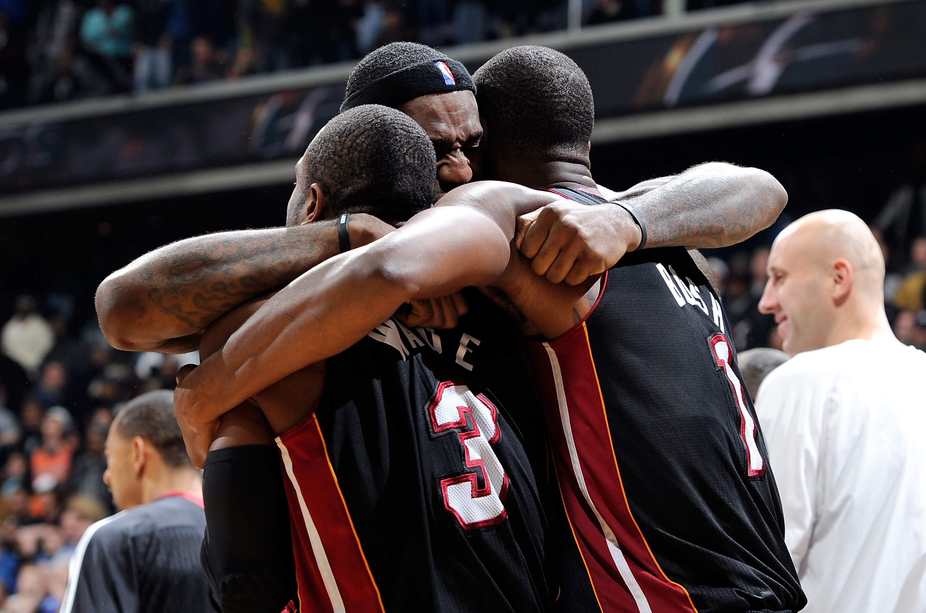 WASHINGTON, DC - DECEMBER 18:  LeBron James #6 of the Miami Heat celebrates with Dwyane Wade #3 and Chris Bosh #1 after a 95-94 victory over the Washington Wizards at the Verizon Center on December 18, 2010 in Washington, DC. NOTE TO USER: User expressly