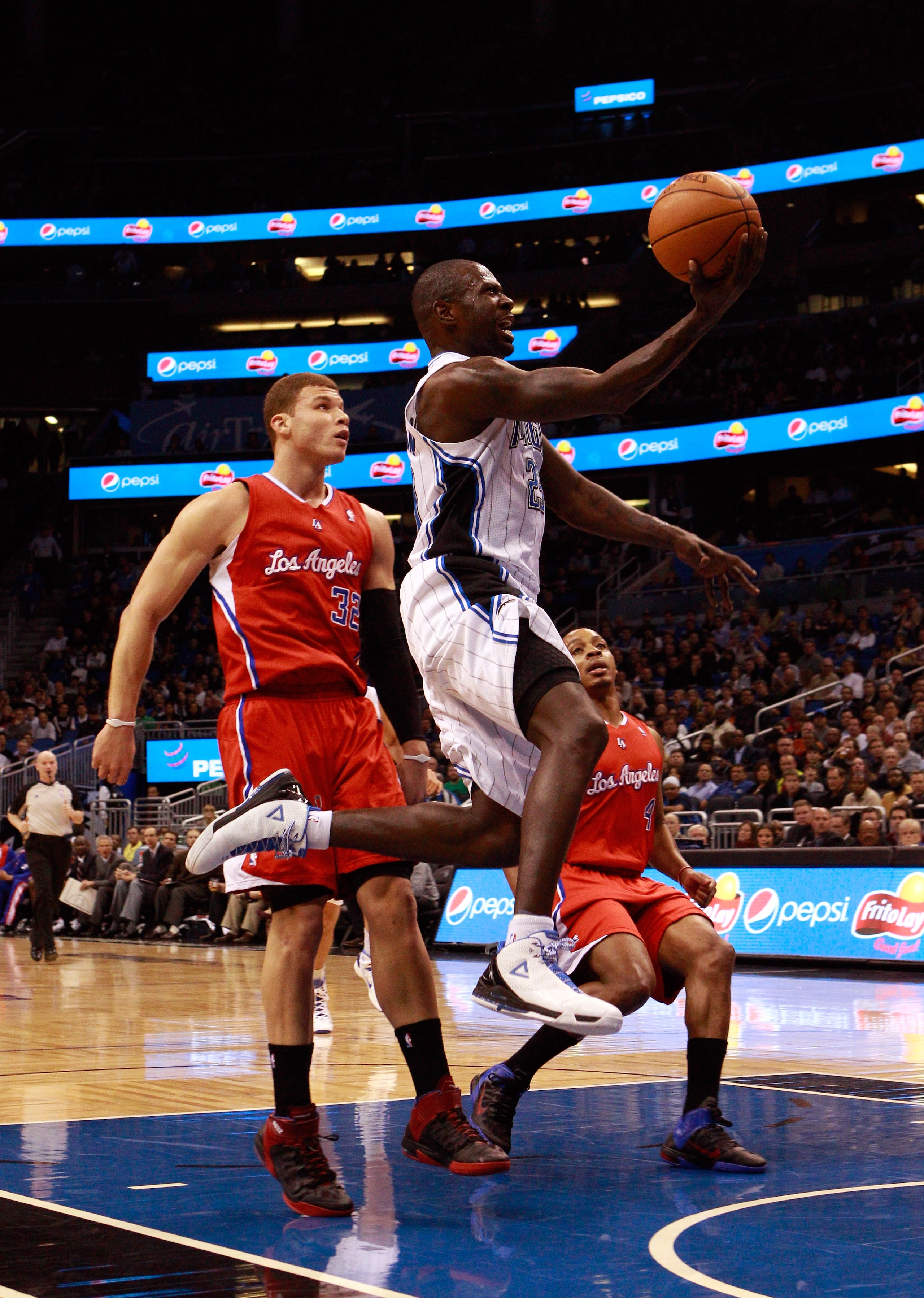 ORLANDO, FL - FEBRUARY 08: Jason Richardson #23 of the Orlando Magic drives past Blake Griffin #32 of the Los Angeles Clippers during the game at Amway Arena on February 8, 2011 in Orlando, Florida. NOTE TO USER: User expressly acknowledges and agrees t ORLANDO, FL - FEBRUARY 08: Jason Richardson #23 of the Orlando Magic drives past Blake Griffin #32 of the Los Angeles Clippers during the game at Amway Arena on February 8, 2011 in Orlando, Florida. NOTE TO USER: User expressly acknowledges and agrees t