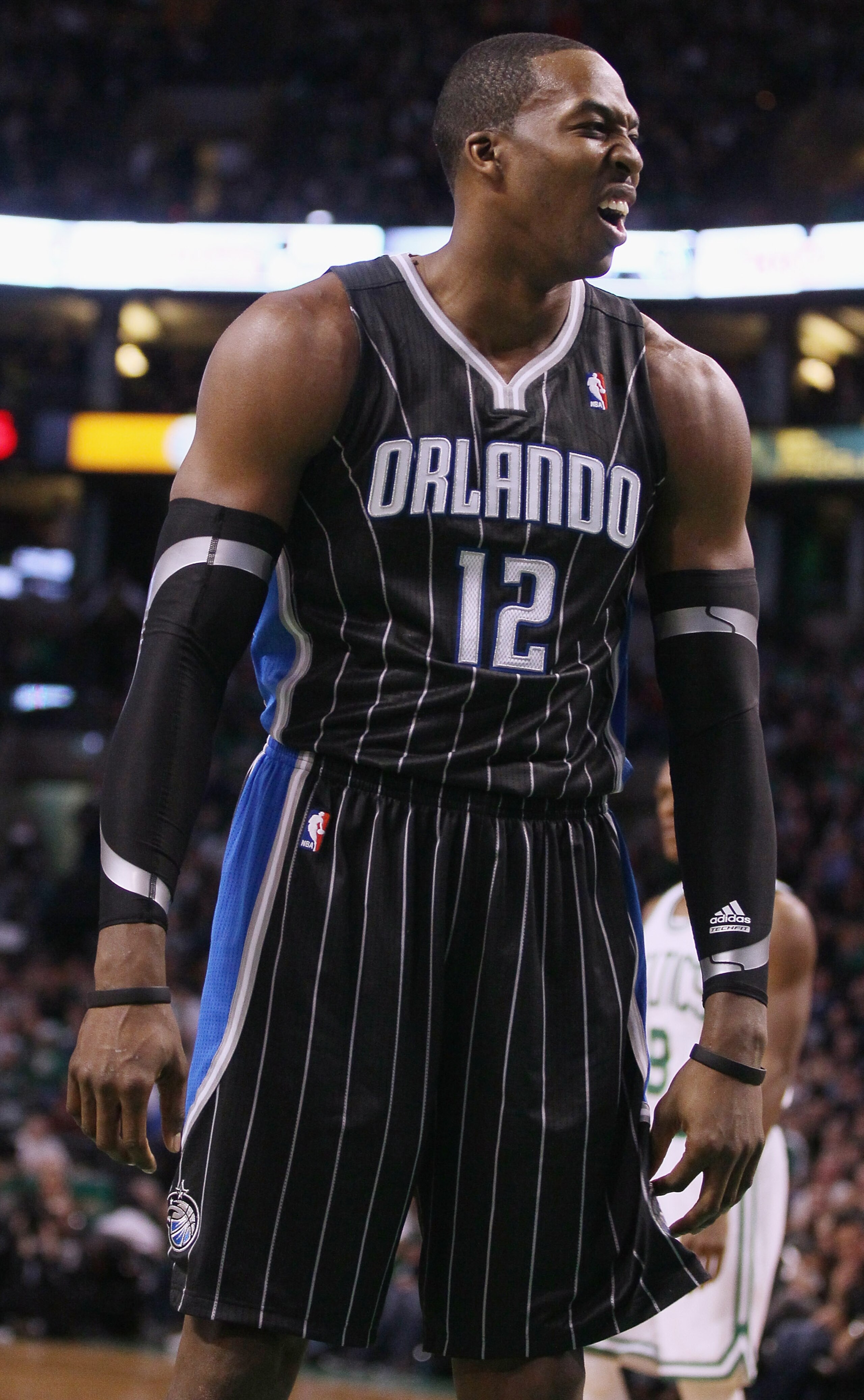 BOSTON, MA - JANUARY 17: Dwight Howard #12 of the Orlando Magic reacts after he is called for a foul in the first quarter against the Boston Celtics on January 17, 2011 at the TD Garden in Boston, Massachusetts. NOTE TO USER: User expressly acknowledges BOSTON, MA - JANUARY 17: Dwight Howard #12 of the Orlando Magic reacts after he is called for a foul in the first quarter against the Boston Celtics on January 17, 2011 at the TD Garden in Boston, Massachusetts. NOTE TO USER: User expressly acknowledges