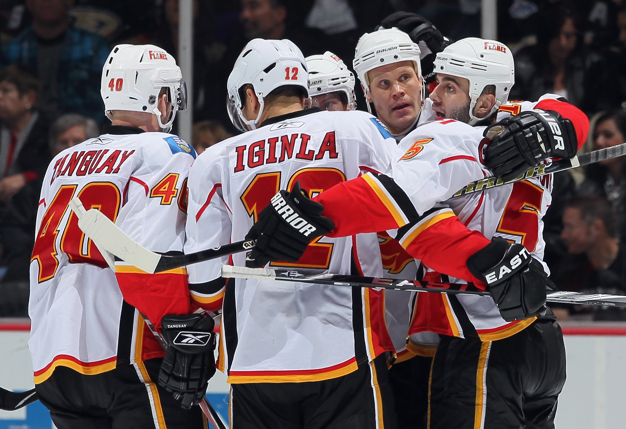 ANAHEIM, CA - DECEMBER 10:  (L-R) Alex Tanguay, #40, Jerome Iginla #12, Olli Jokinen #13 and Mark Giordano #5 of the Calgary Flames celebrate Jokinen's goal against the Anaheim Ducks in the third period at the Honda Center on December 10, 2010 in Anaheim,