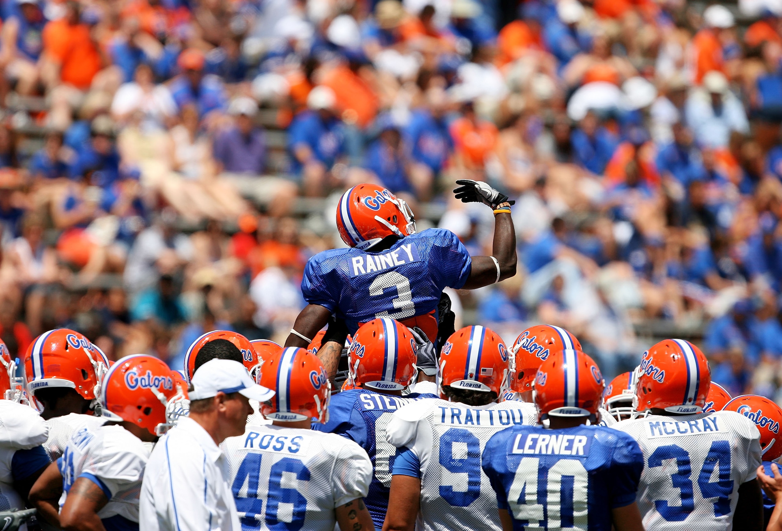 GAINESVILLE, FL - APRIL 10:  Running back Chris Rainey #3 of the Florida Gators is lifted up by his teammates during warm-up before the Orange & Blue game at Ben Hill Griffin Stadium on April 10, 2010 in Gainesville, Florida.  (Photo by Doug Benc/Getty Im