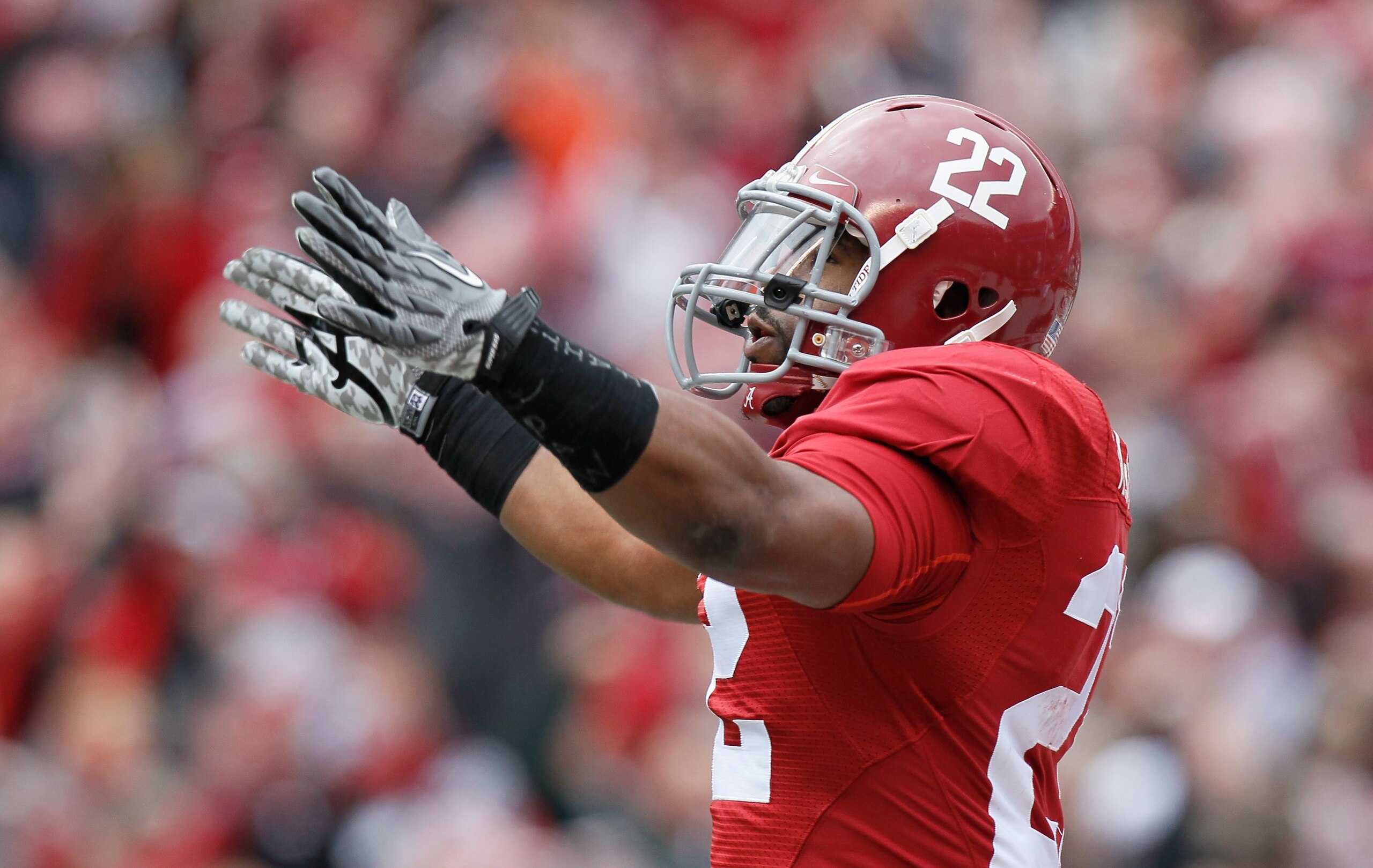 TUSCALOOSA, AL - NOVEMBER 26: Mark Ingram #22 of the Alabama Crimson Tide reacts after rushing for a touchdown against the Auburn Tigers at Bryant-Denny Stadium on November 26, 2010 in Tuscaloosa, Alabama. (Photo by Kevin C. Cox/Getty Images) TUSCALOOSA, AL - NOVEMBER 26: Mark Ingram #22 of the Alabama Crimson Tide reacts after rushing for a touchdown against the Auburn Tigers at Bryant-Denny Stadium on November 26, 2010 in Tuscaloosa, Alabama. (Photo by Kevin C. Cox/Getty Images)