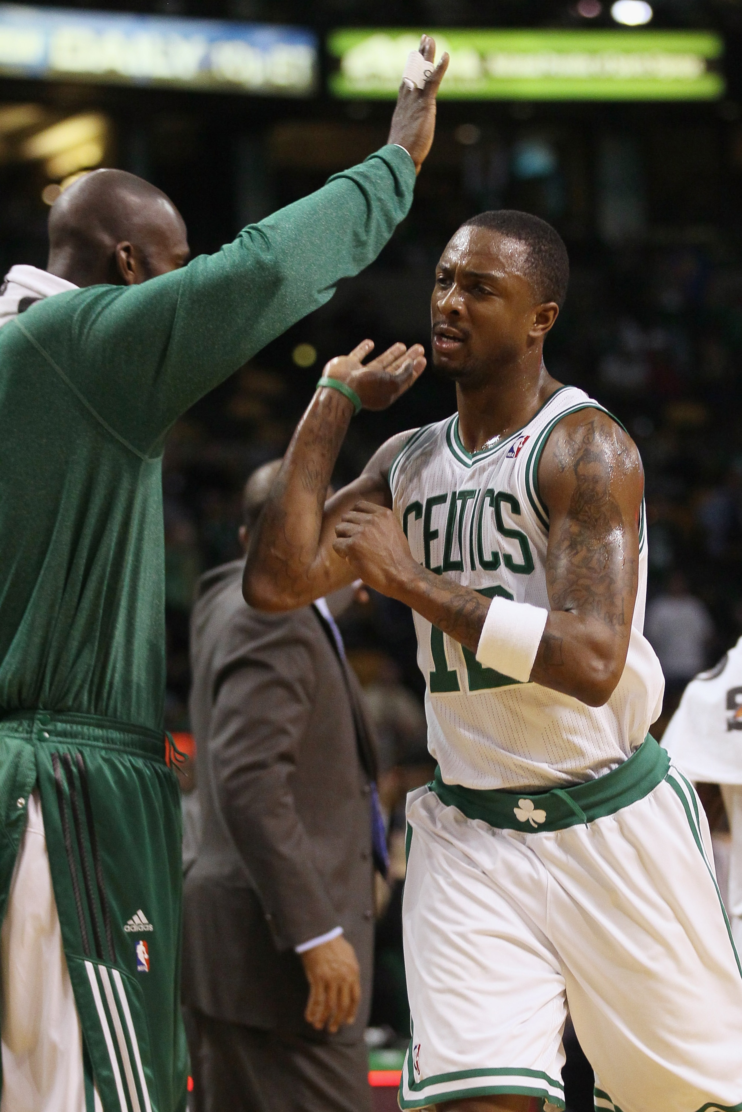 BOSTON, MA - JANUARY 21:  Von Wafer #12 of the Boston Celtics celebrates with Kevin Garnett #5 after the win over the Utah Jazz on January 21, 2011 at the TD Garden in Boston, Massachusetts.  The Celtics defeated the Jazz 110-86. NOTE TO USER: User expres