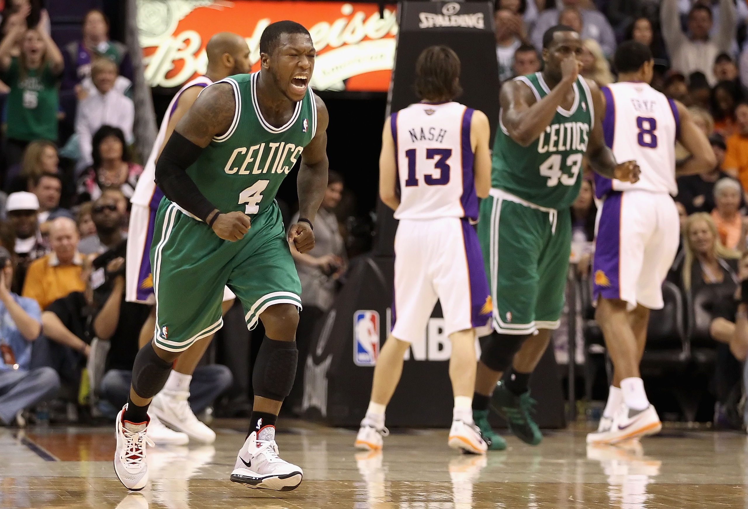 PHOENIX, AZ - JANUARY 28:  Nate Robinson #4 of the Boston Celtics celebrates after scoring against the Phoenix Suns during the NBA game at US Airways Center on January 28, 2011 in Phoenix, Arizona. The Suns defeated the Celtics 88-71. NOTE TO USER: User e