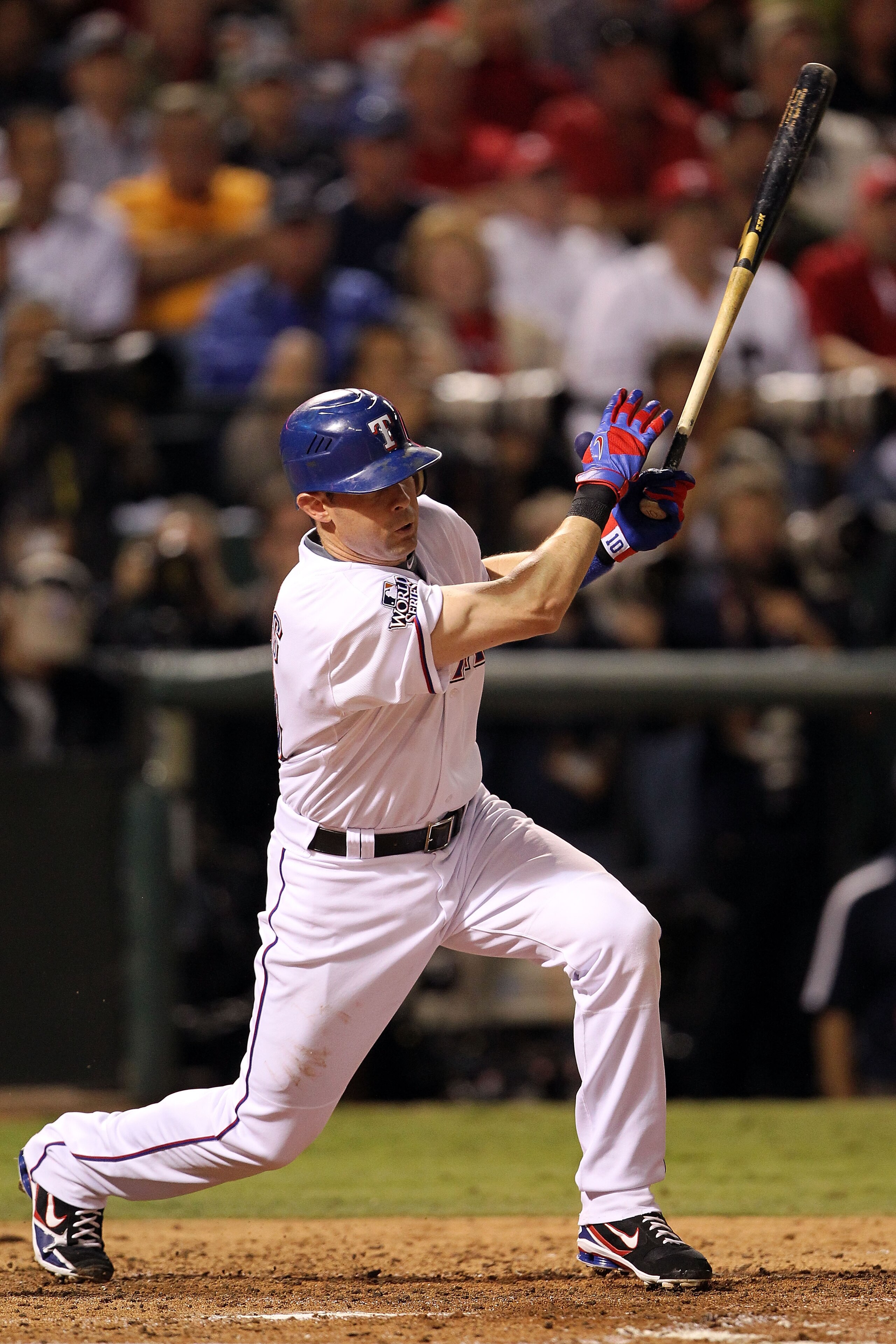 ARLINGTON, TX - NOVEMBER 01:  Michael Young #10 of the Texas Rangers singles in the fourth inning against the San Francisco Giants in Game Five of the 2010 MLB World Series at Rangers Ballpark in Arlington on November 1, 2010 in Arlington, Texas.  (Photo
