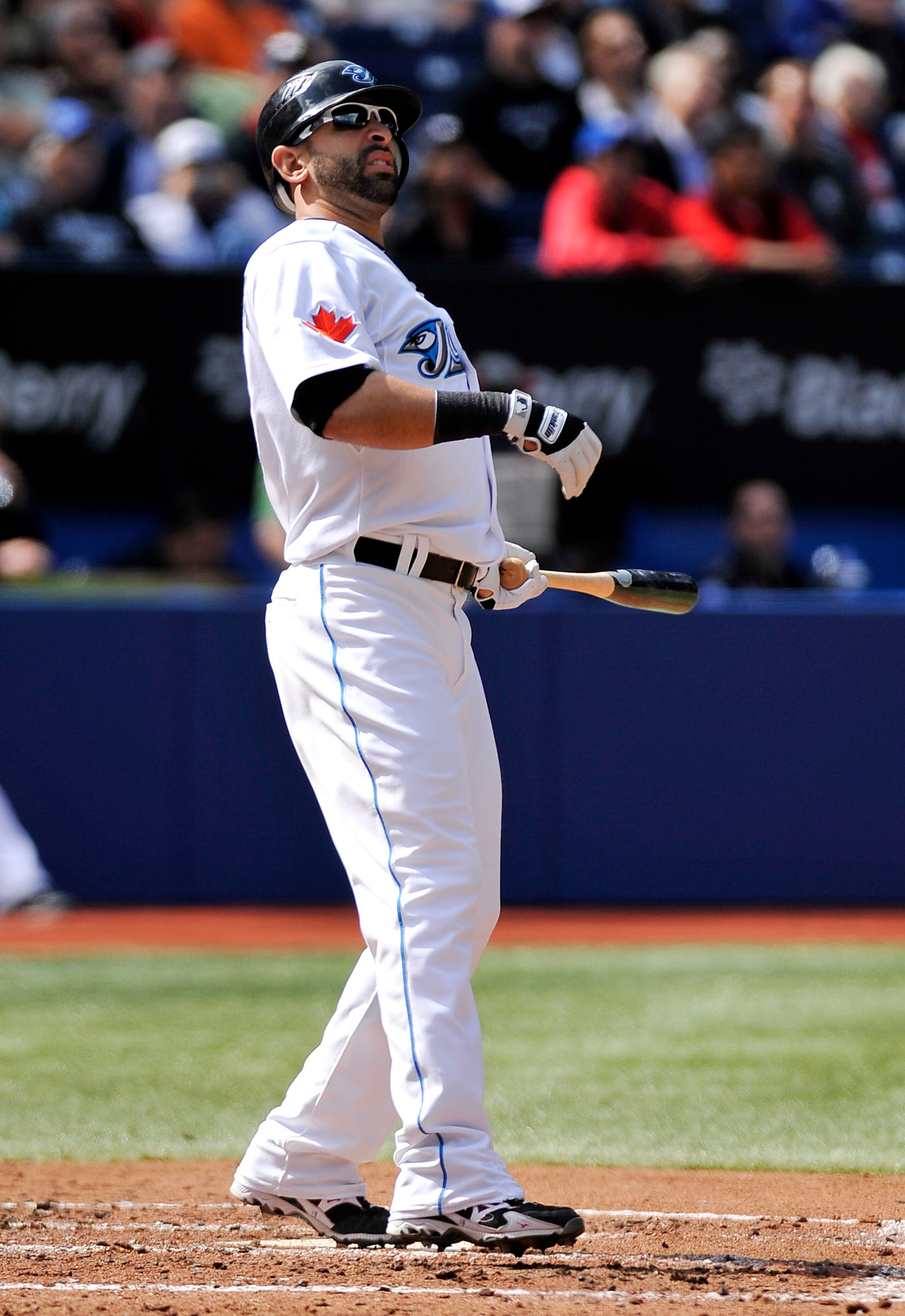 TORONTO - SEPTEMBER 23:   Jose Bautista #19 of the Toronto Blue Jays watches his foul ball during the game against the Seattle Mariners on September 23, 2010 at Rogers Centre in Toronto, Ontario, Canada. The Blue Jays defeated the Mariners 1-0. (Photo by