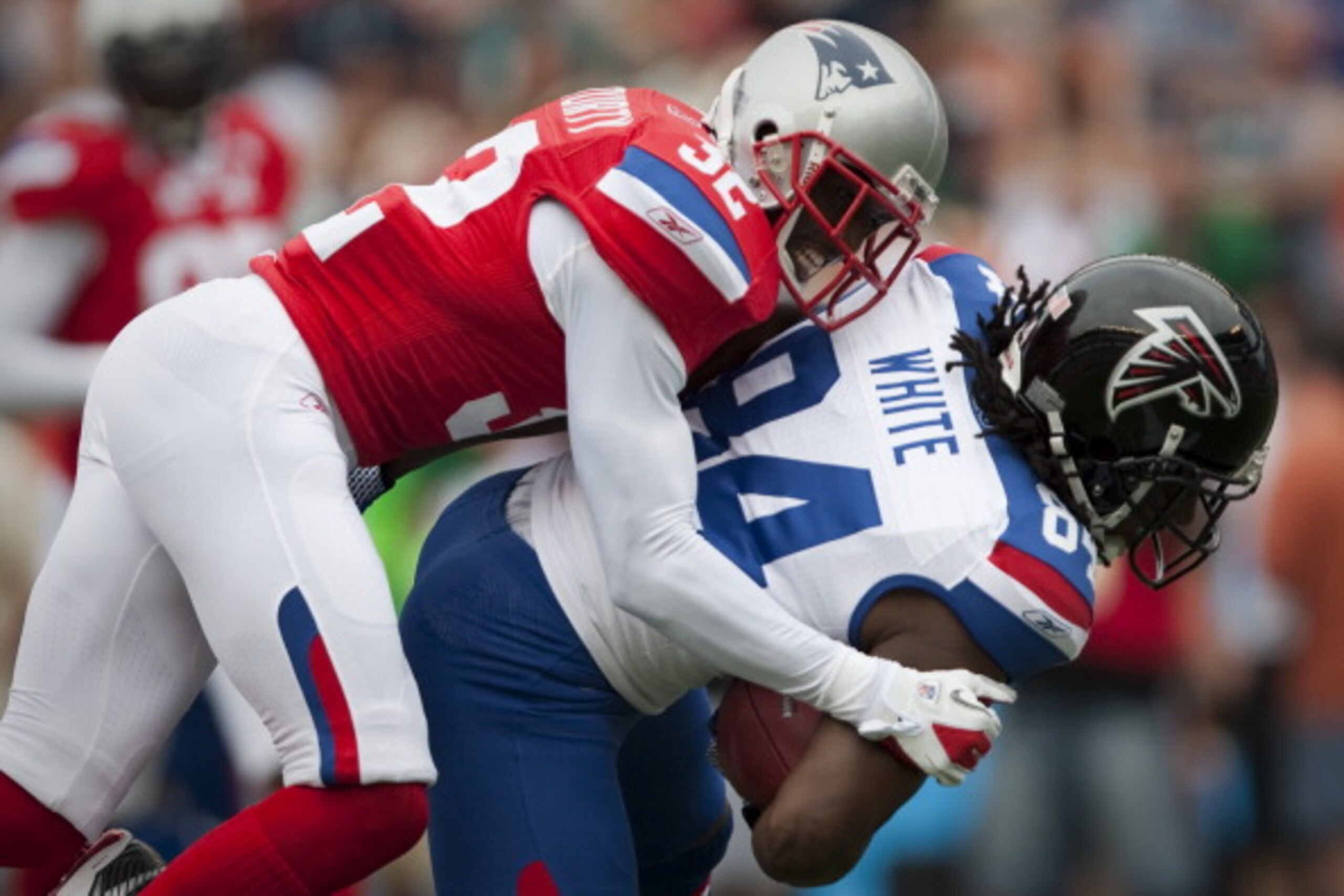 HONOLULU - JANUARY 30: Devin McCourty, #32 of the New England Patriots, tackles Roddy White, #84 of the Atlanta Falcons, during the 2011 NFL Pro Bowl at Aloha Stadium on January 30, 2011 in Honolulu, Hawaii. (Photo by Kent Nishimura/Getty Images) HONOLULU - JANUARY 30: Devin McCourty, #32 of the New England Patriots, tackles Roddy White, #84 of the Atlanta Falcons, during the 2011 NFL Pro Bowl at Aloha Stadium on January 30, 2011 in Honolulu, Hawaii. (Photo by Kent Nishimura/Getty Images)