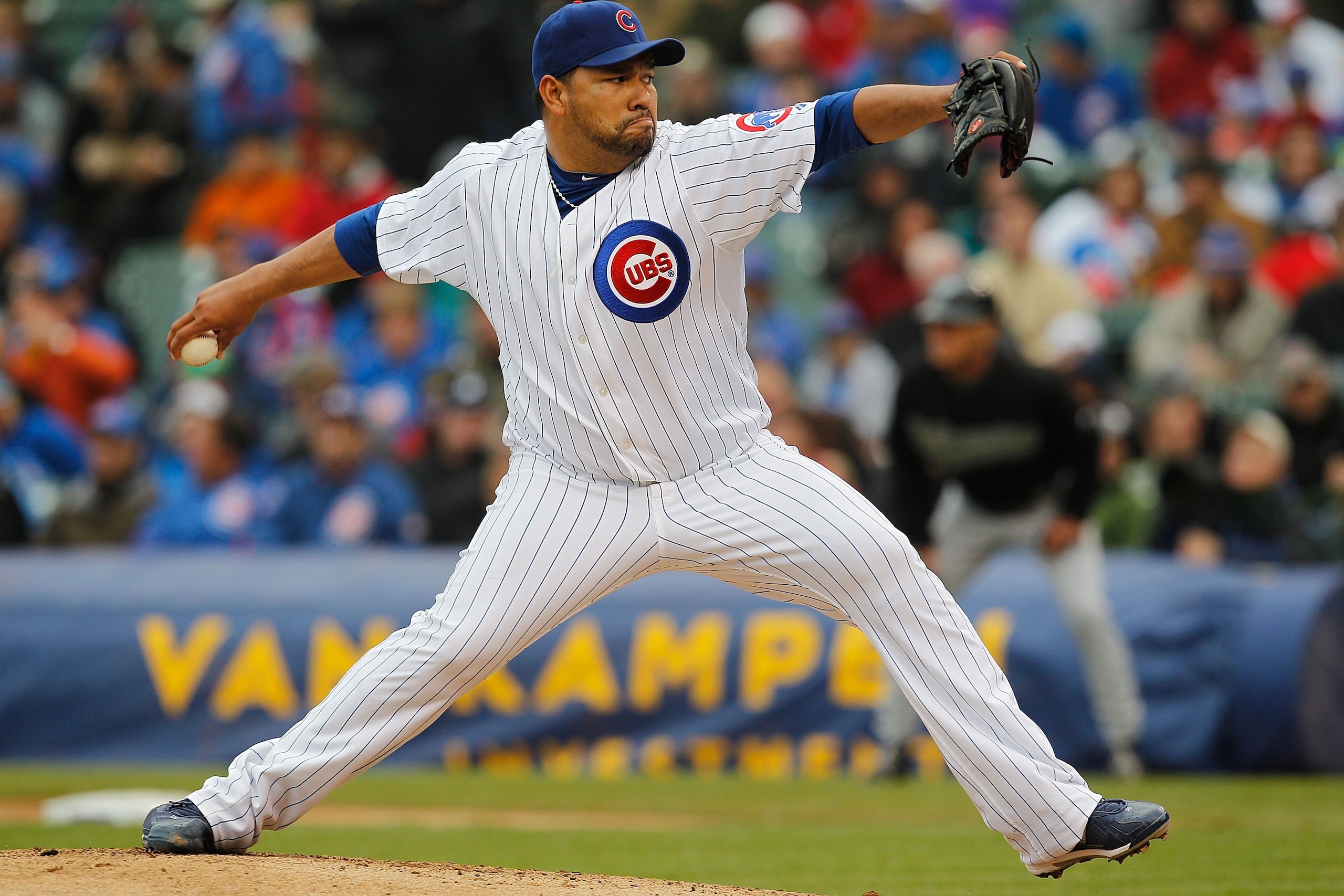 CHICAGO - MAY 12: Starting pitcher Carlos Silva #52 of the Chicago Cubs delivers the ball against the Florida Marlins at Wrigley Field on May 12, 2010 in Chicago, Illinois. The Cubs defeated the Marlins 4-3.  (Photo by Jonathan Daniel/Getty Images)