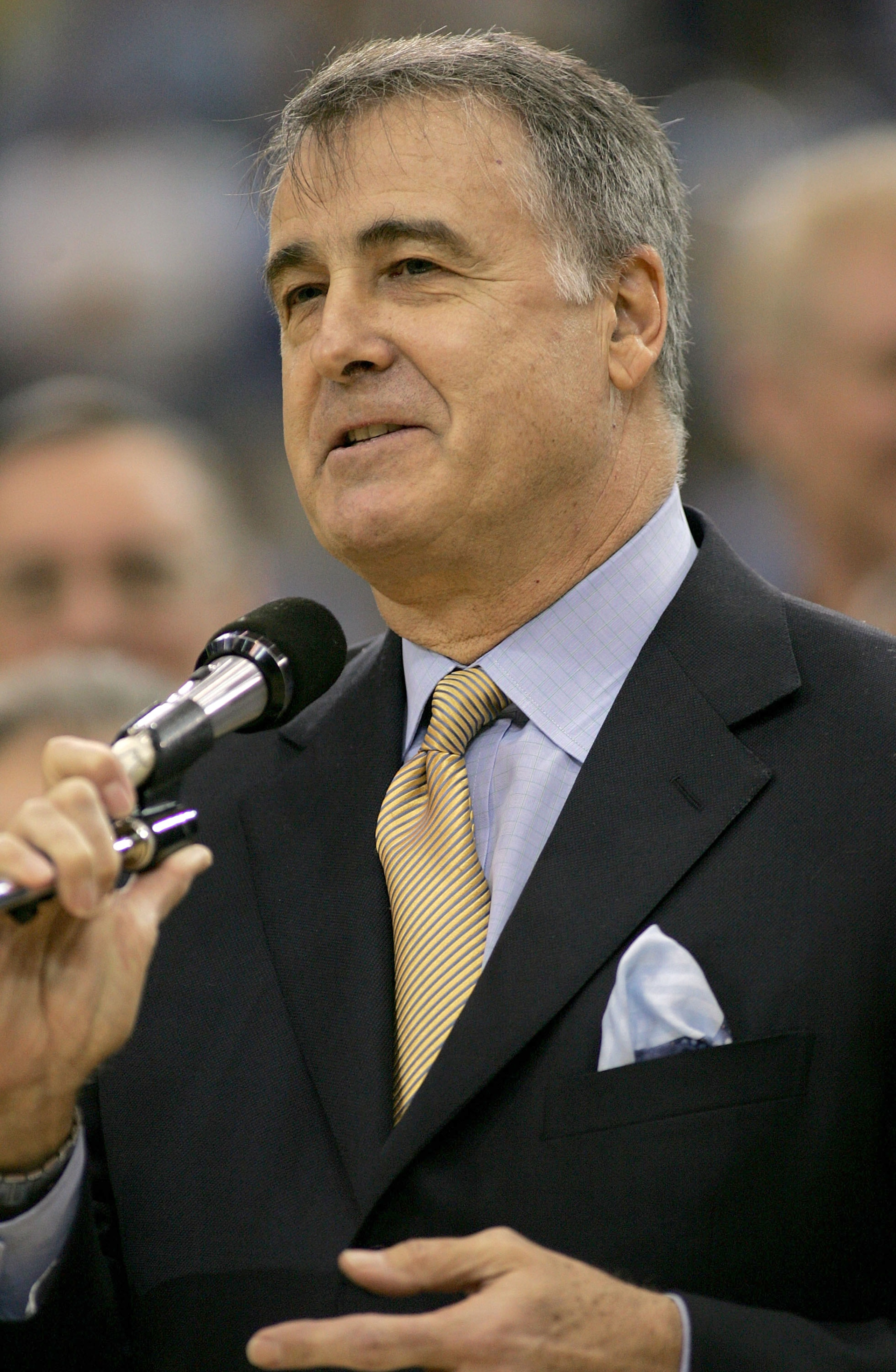 LOS ANGELES - DECEMBER 18: Former UCLA Bruin Gail Goodrich speaks to the crowd as his number is retired during halftime of the game between the UCLA Bruins and the Michigan Wolverines on December 18, 2004 at Pauley Pavilion in Los Angeles, California. ( LOS ANGELES - DECEMBER 18: Former UCLA Bruin Gail Goodrich speaks to the crowd as his number is retired during halftime of the game between the UCLA Bruins and the Michigan Wolverines on December 18, 2004 at Pauley Pavilion in Los Angeles, California. (