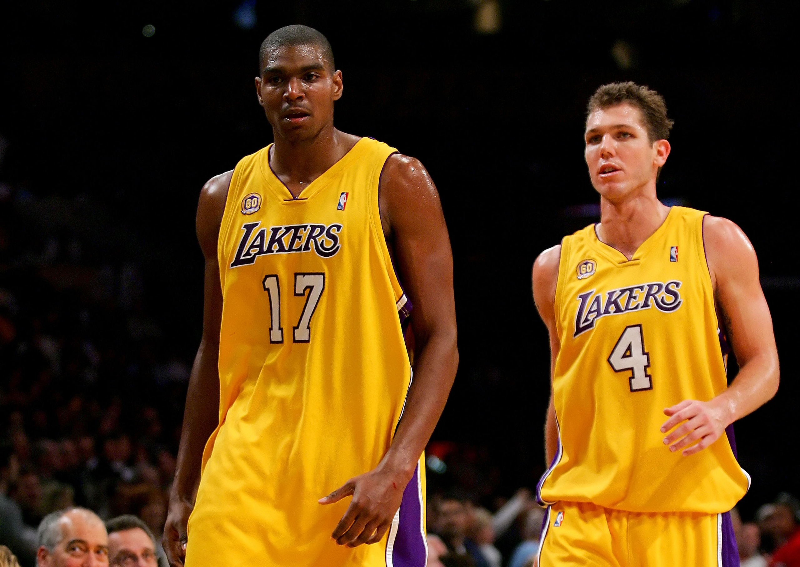 LOS ANGELES, CA - DECEMBER 13:  Andrew Bynum #17 of the Los Angeles Lakers walks off the court with teammate Luke Walton #4 after being ejected from the game in the third quarter against the San Antonio Spurs at Staples Center on December 13, 2007 in Los 