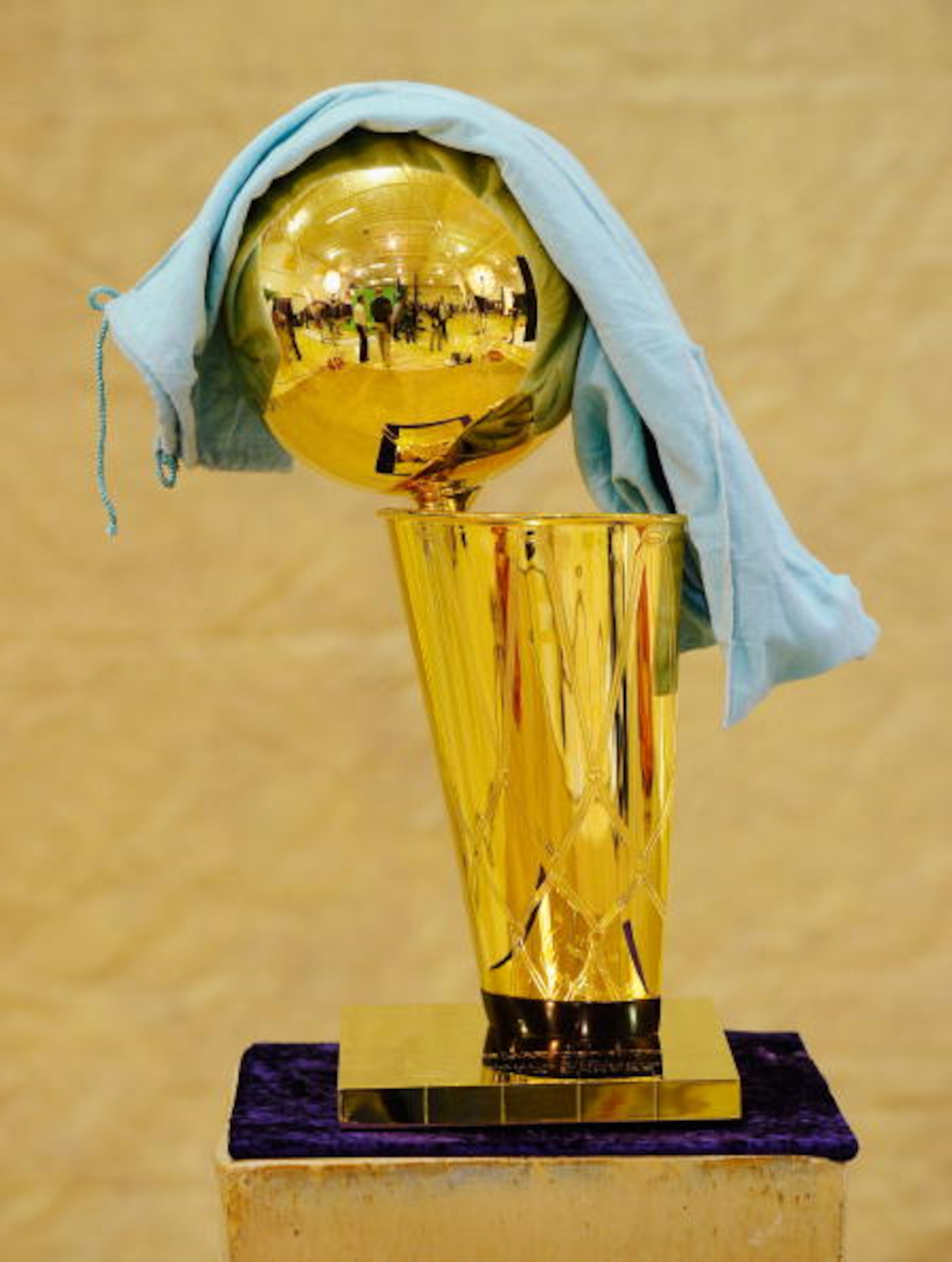 EL SEGUNDO, CA - SEPTEMBER 25: NBA Finals Larry O'Brien Championship Trophy is covered with a protective cloth as it rest on a stand during the Los Angeles Lakers Media Day at the Toyota Center on September 25, 2010 in El Segundo, California. NOTE TO USE EL SEGUNDO, CA - SEPTEMBER 25: NBA Finals Larry O'Brien Championship Trophy is covered with a protective cloth as it rest on a stand during the Los Angeles Lakers Media Day at the Toyota Center on September 25, 2010 in El Segundo, California. NOTE TO USE