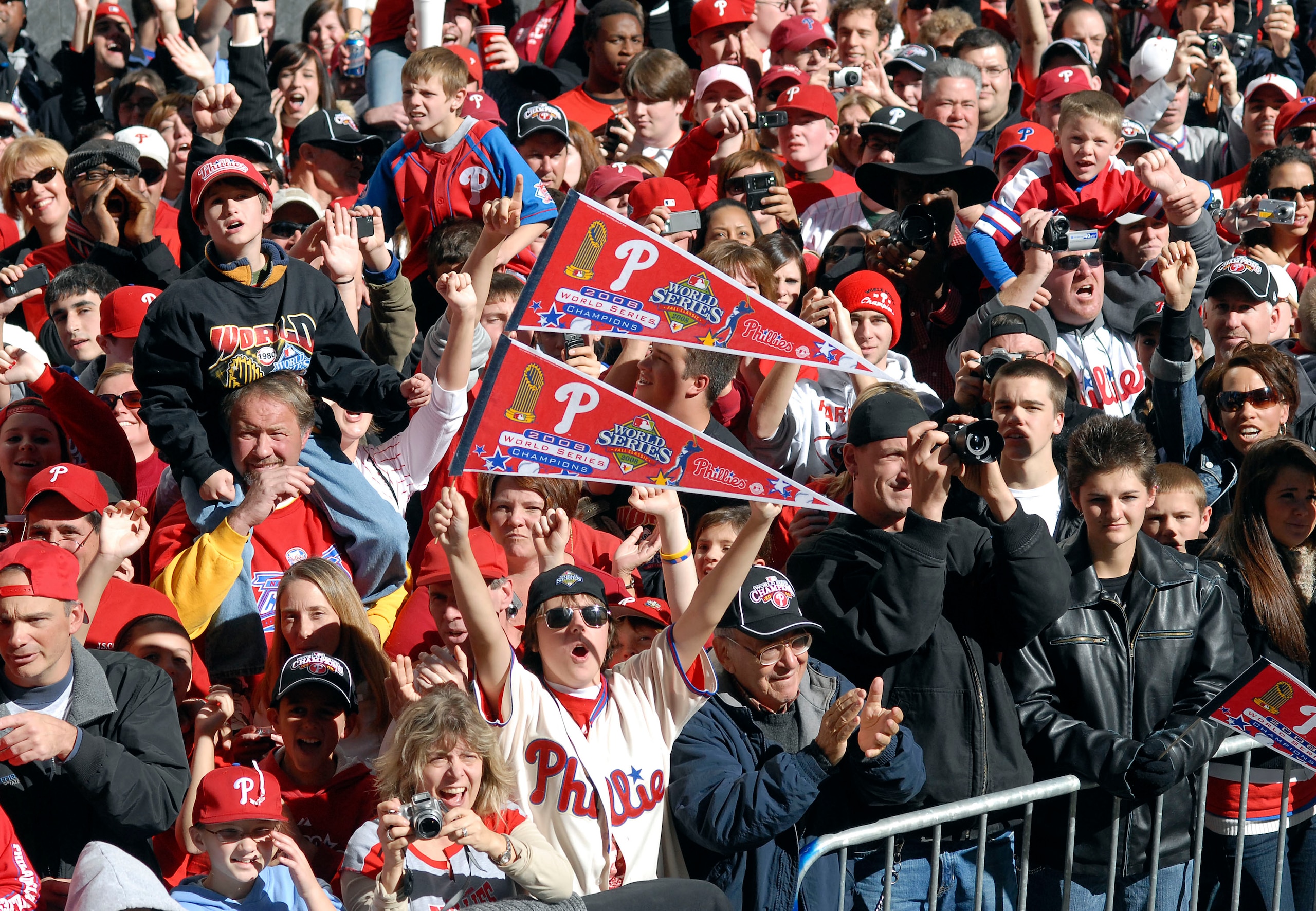 PHILADELPHIA, PA - OCTOBER 31: Fans of the Philadelphia Phillies celebrate during the World Championship Parade October 31, 2008 in Philadelphia, Pennsylvania. The Phillies defeated the Tampa Bay Rays to win their first World Series in 28 years.  (Photo b