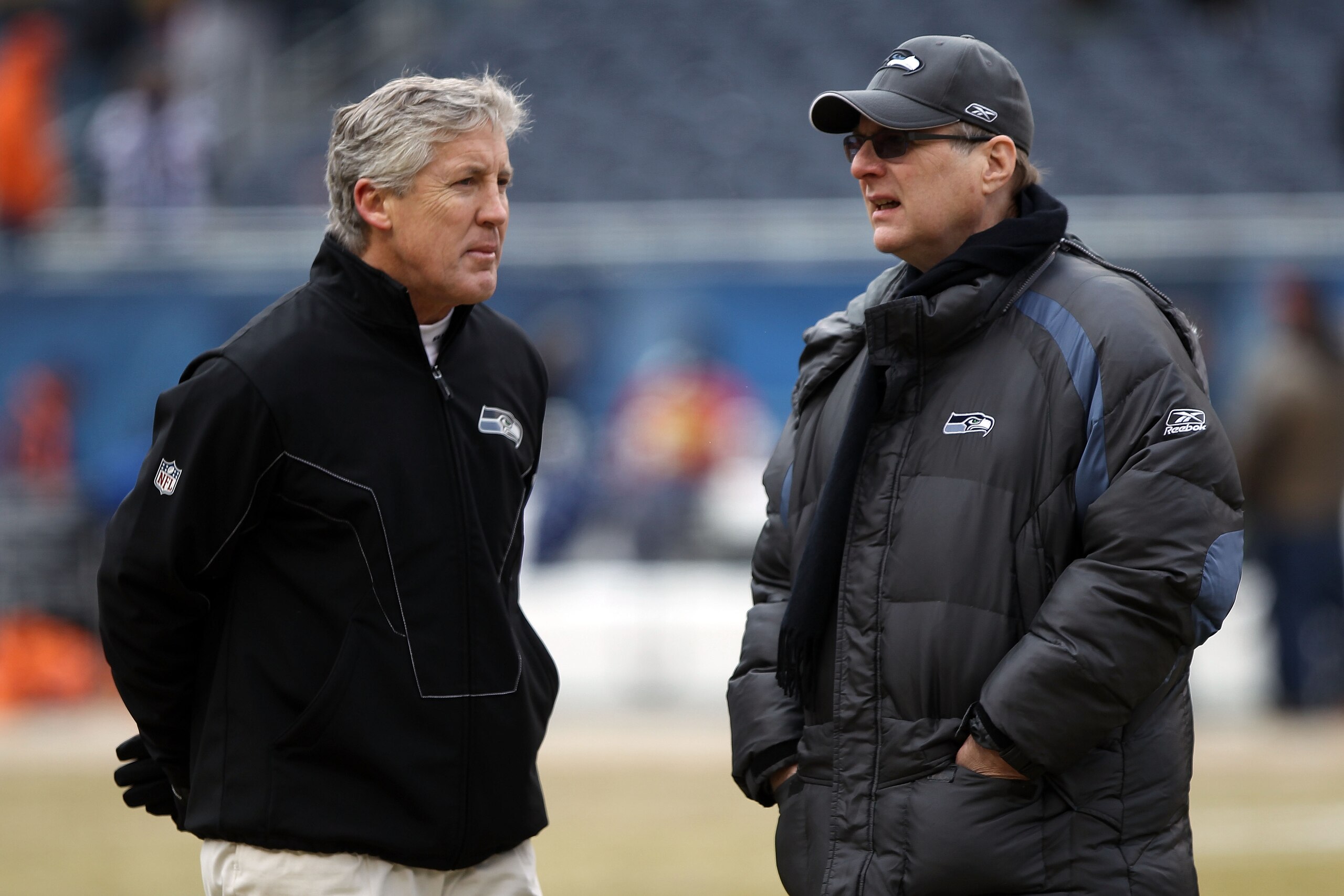 CHICAGO, IL - JANUARY 16: (L-R) Head coach Pete Carroll of the Seattle Seahawks talks with Seahawks team owner Paul Allen before the 2011 NFC divisional playoff game against the Chicago Bears at Soldier Field on January 16, 2011 in Chicago, Illinois. (P CHICAGO, IL - JANUARY 16: (L-R) Head coach Pete Carroll of the Seattle Seahawks talks with Seahawks team owner Paul Allen before the 2011 NFC divisional playoff game against the Chicago Bears at Soldier Field on January 16, 2011 in Chicago, Illinois. (P