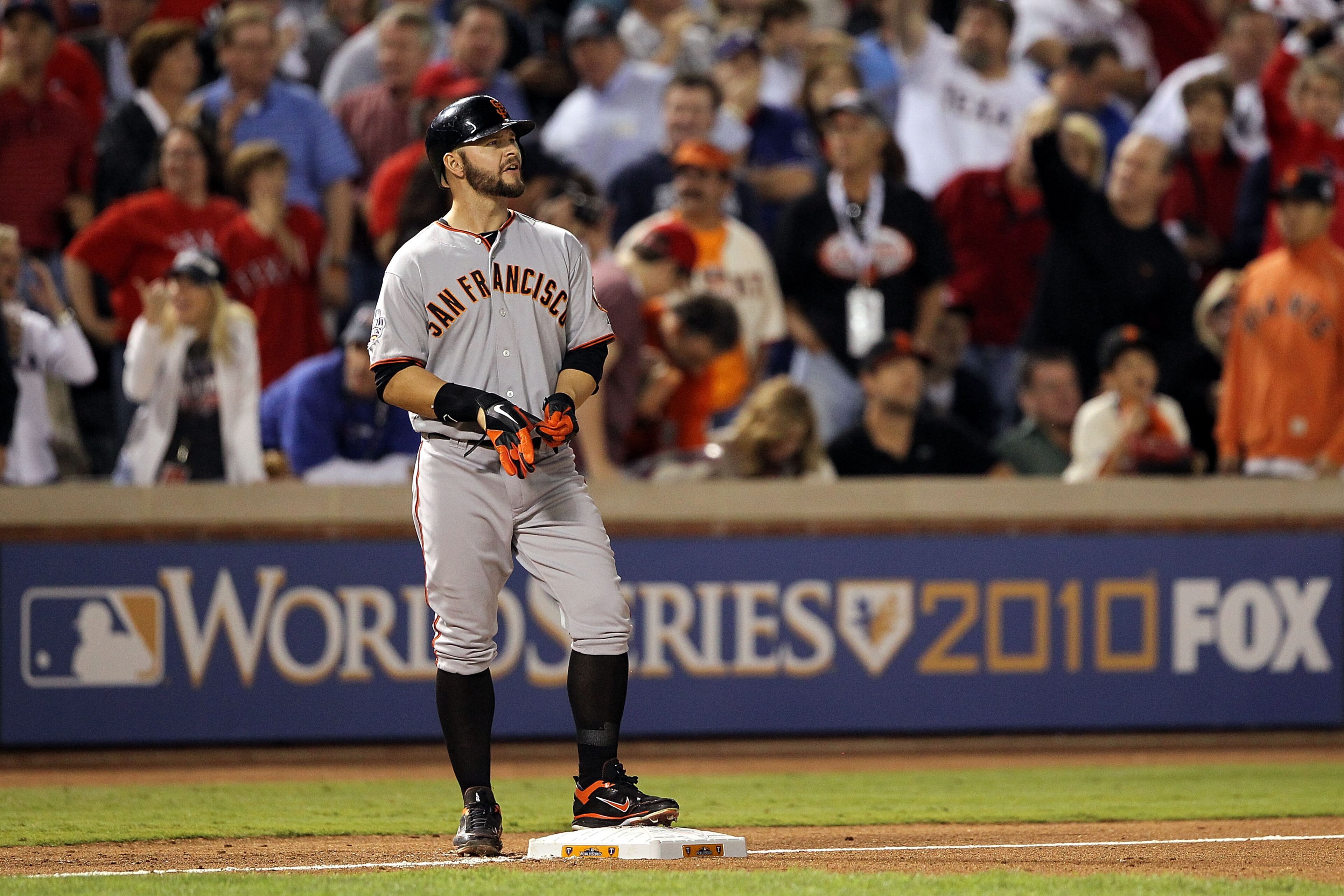 ARLINGTON, TX - NOVEMBER 01:  Cody Ross #13 of the San Francisco Giants stands on third base in the seventh inning against the Texas Rangers in Game Five of the 2010 MLB World Series at Rangers Ballpark in Arlington on November 1, 2010 in Arlington, Texas