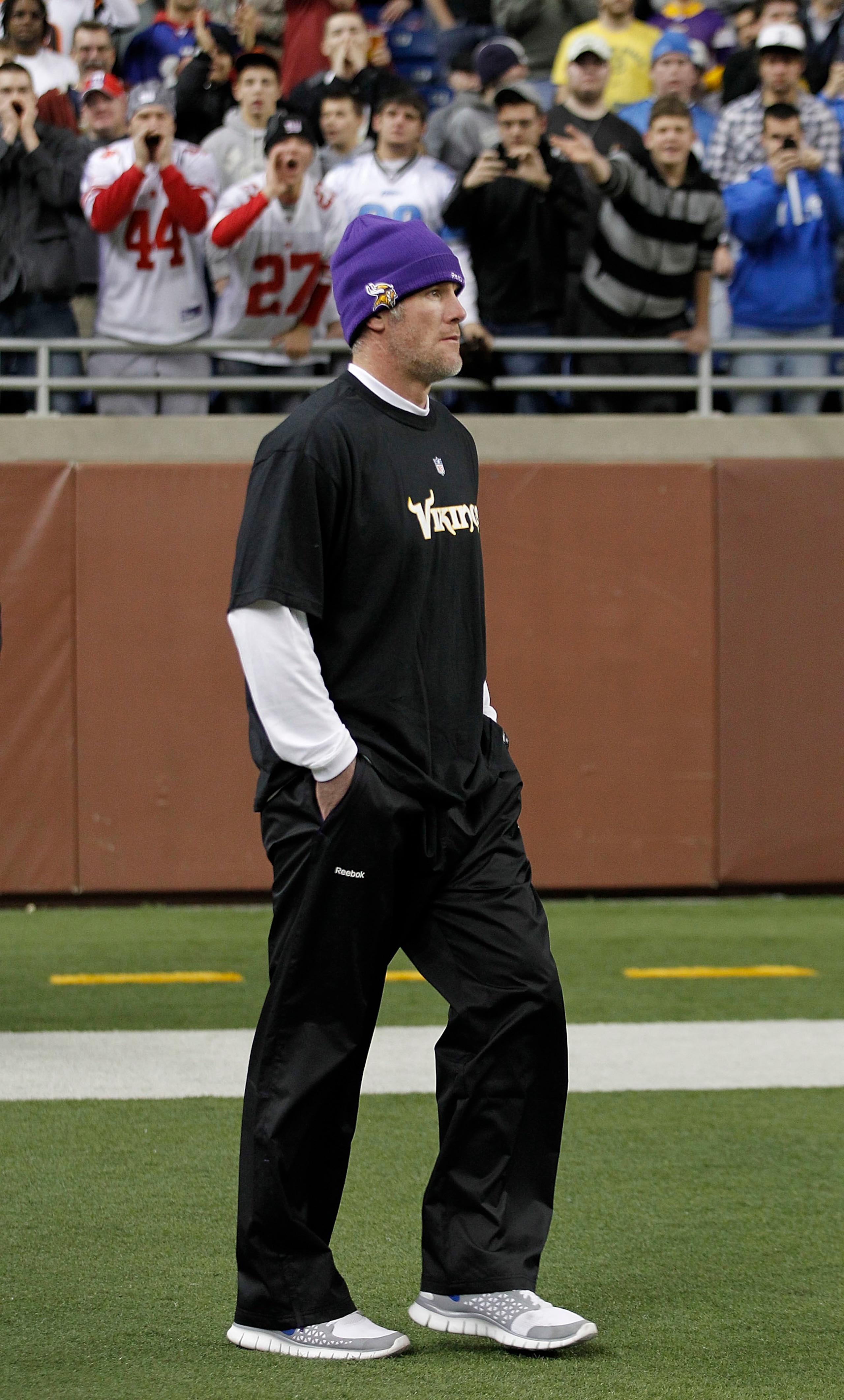 DETROIT, MI - DECEMBER 13: Brett Favre #4 of the Minnesota Vikings walks on the field during pre-game warm ups and will not dress for the game against the New York Giants on December 13, 2010 in Detroit, Michigan. (Photo by Leon Halip/Getty Images) DETROIT, MI - DECEMBER 13: Brett Favre #4 of the Minnesota Vikings walks on the field during pre-game warm ups and will not dress for the game against the New York Giants on December 13, 2010 in Detroit, Michigan. (Photo by Leon Halip/Getty Images)