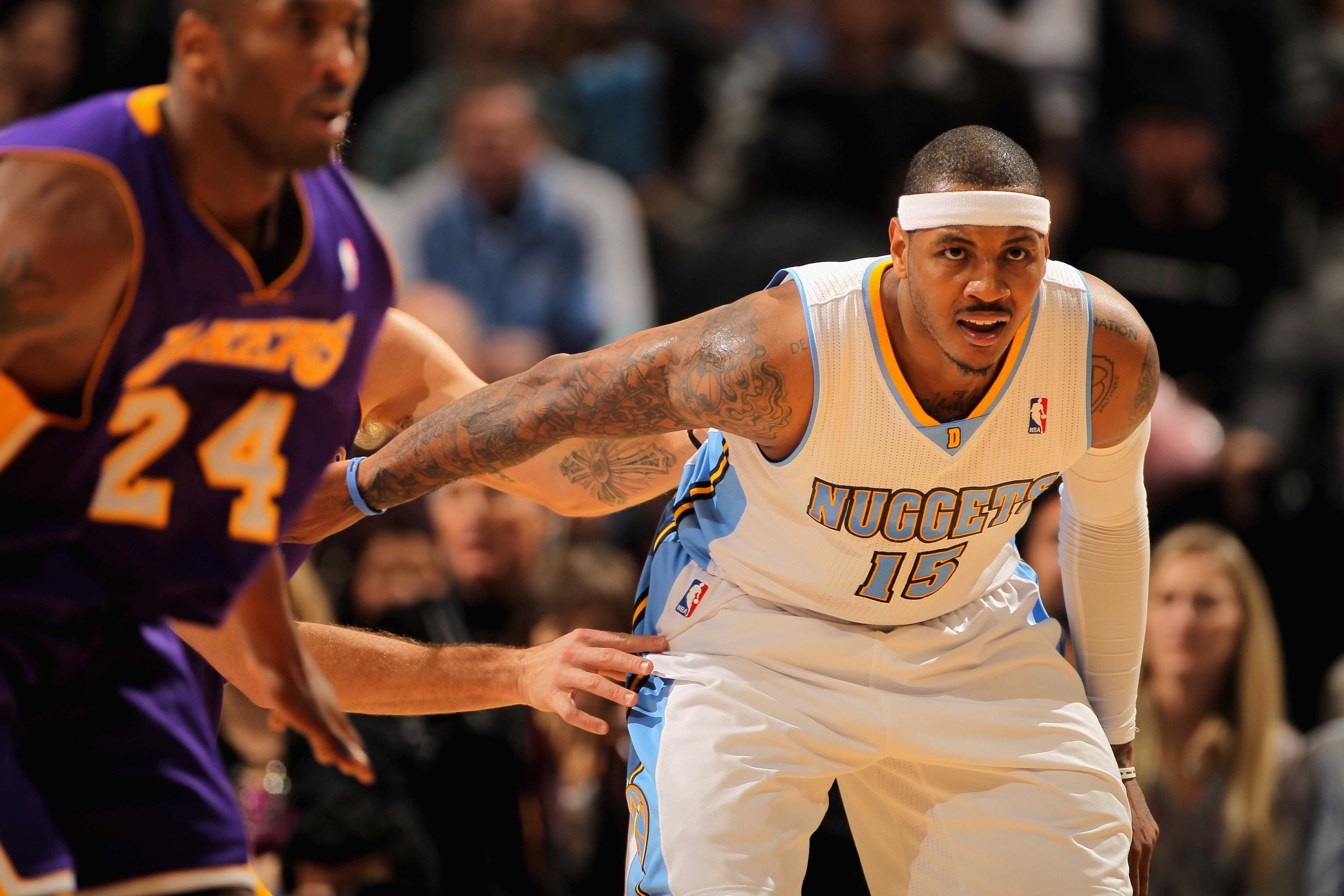 DENVER, CO - JANUARY 21:  Carmelo Anthony #15 of the Denver Nuggets gets open and lookls for the ball against the Los Angeles Lakers at the Pepsi Center on January 21, 2011 in Denver, Colorado. The Lakers defeated the Nuggets 107-97. NOTE TO USER: User ex