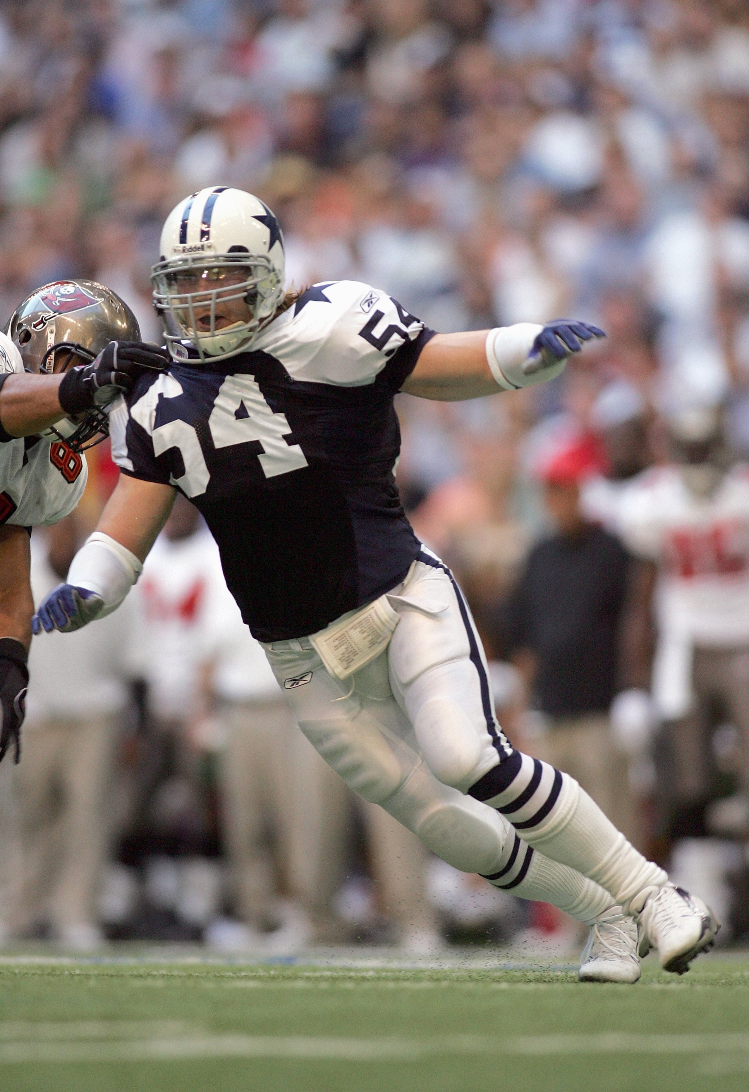 DALLAS - NOVEMBER 23:  Bobby Carpenter #54 of the Dallas Cowboys moves on the field during the game against the Tampa Bay Buccaneers at Texas Stadium November 23, 2006 in Irving, Texas. (Photo by Ronald Martinez/Getty Images)