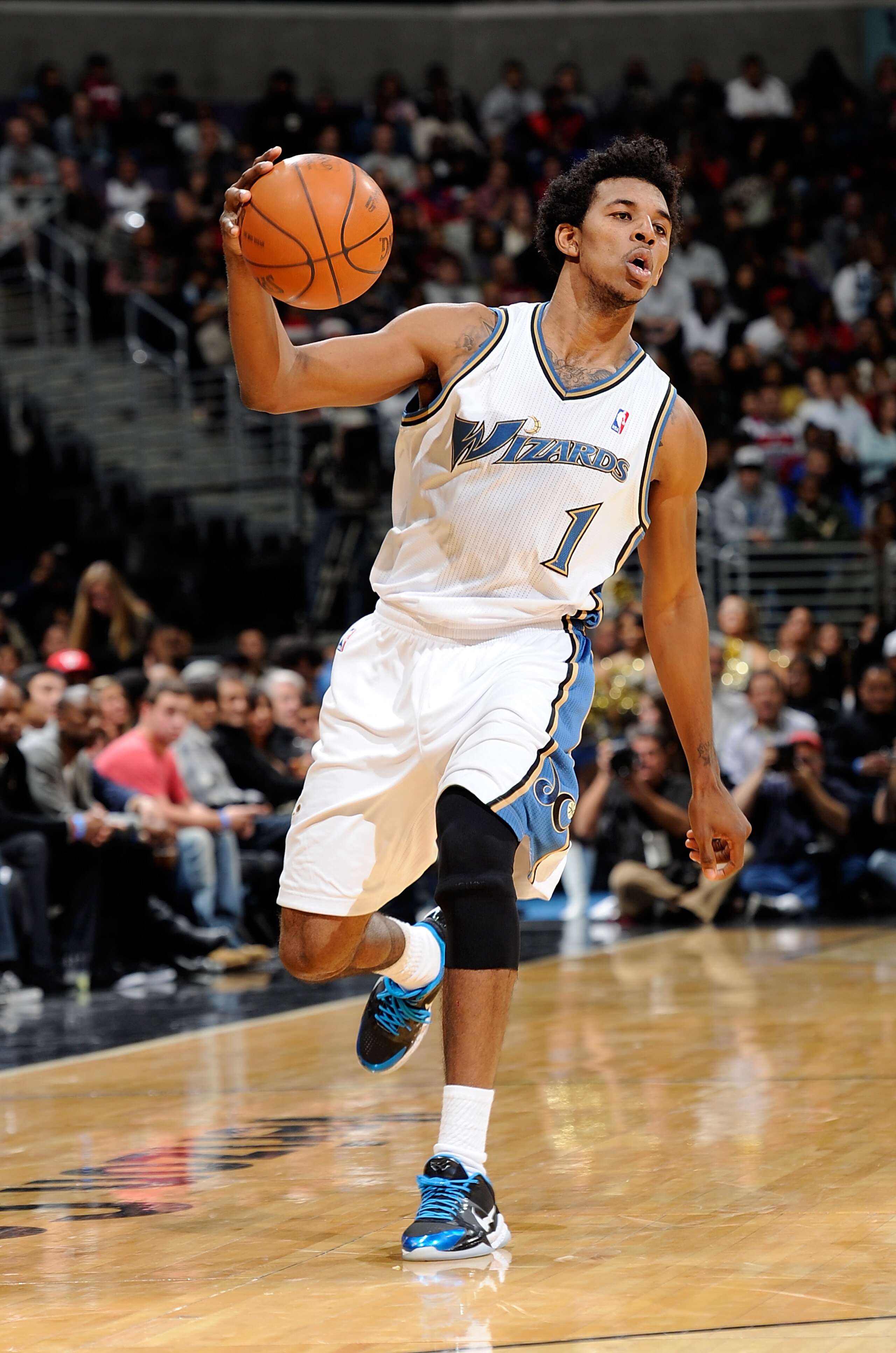 WASHINGTON, DC - DECEMBER 18:  Nick Young #1 of the Washington Wizards handles the ball against the Miami Heat at the Verizon Center on December 18, 2010 in Washington, DC. NOTE TO USER: User expressly acknowledges and agrees that, by downloading and or u