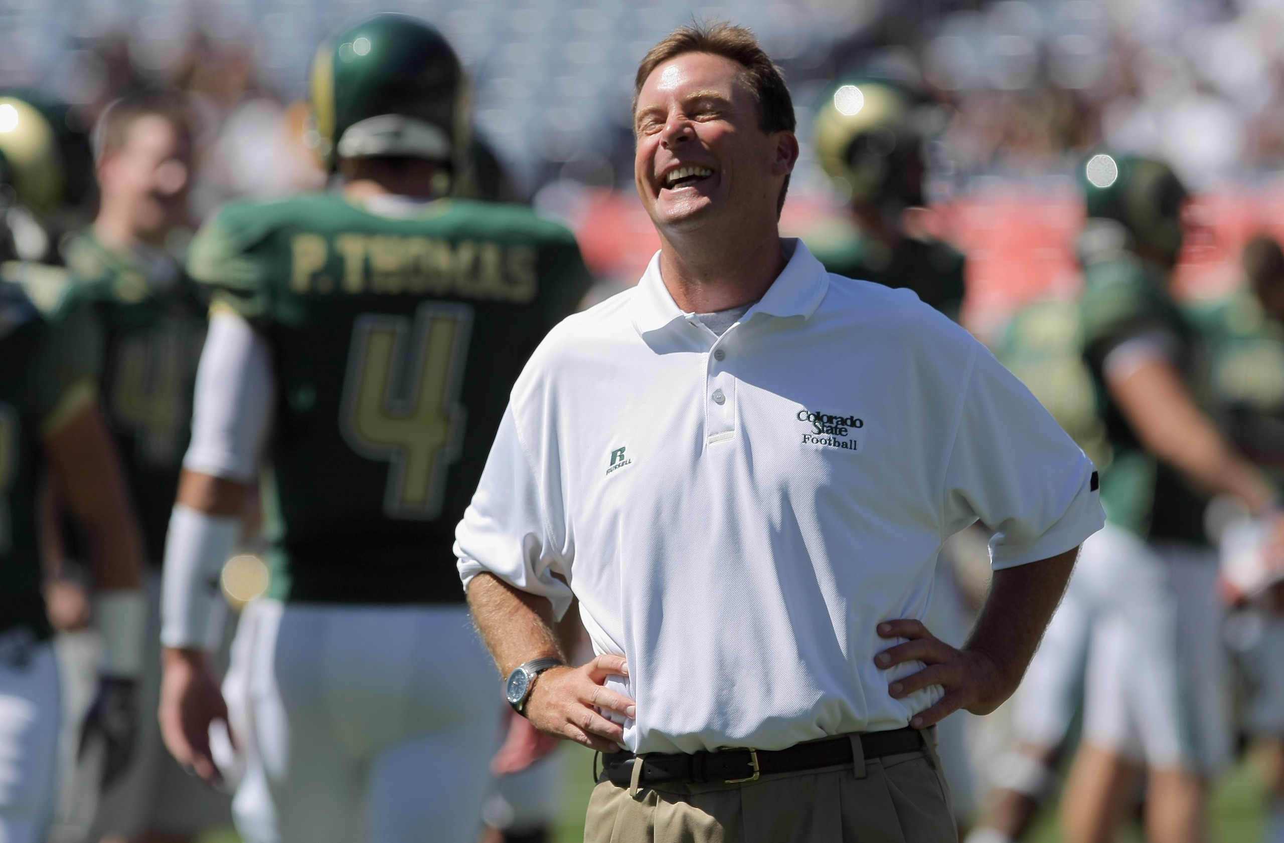 DENVER - SEPTEMBER 04:  Head coach Steve Fairchild of the Colorado State Rams reacts after talking to quarterback Pete Thomas #4 as they face the Colorado Buffaloes in the Rocky Mountain Showdown at INVESCO Field at Mile High on September 4, 2010 in Denve