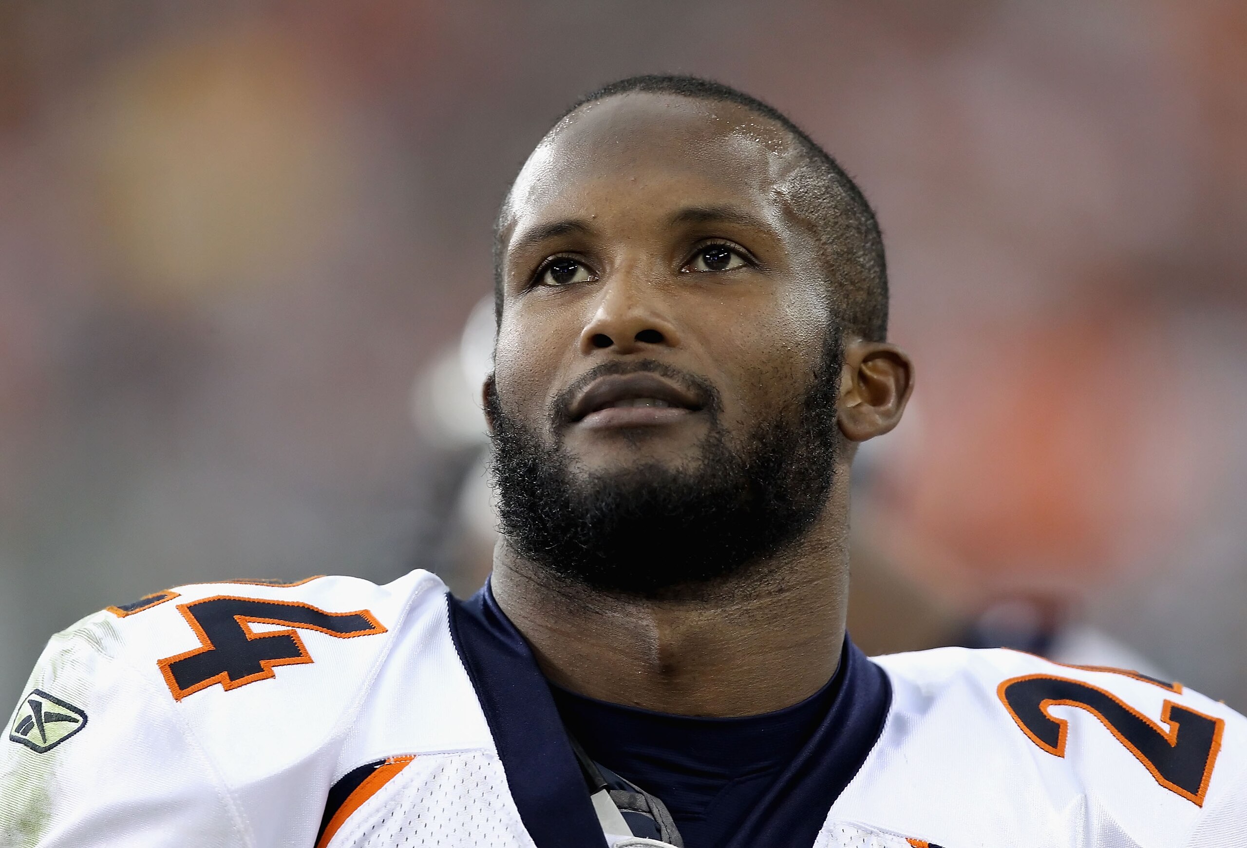 GLENDALE, AZ - DECEMBER 12:  Cornerback Champ Bailey #24 of the Denver Broncos stands on the sidelines during the NFL game against the Arizona Cardinals at the University of Phoenix Stadium on December 12, 2010 in Glendale, Arizona.  The Cardinals defeate