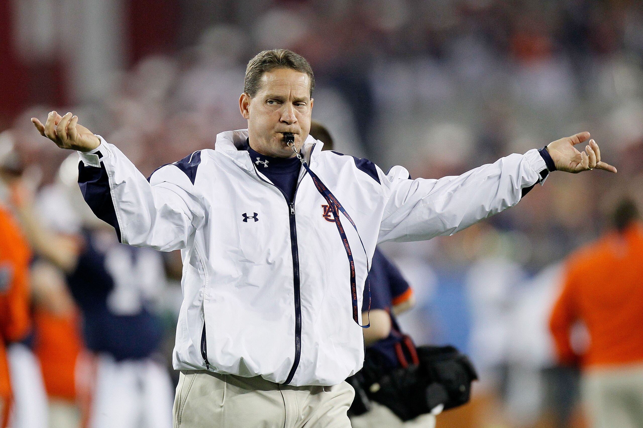 GLENDALE, AZ - JANUARY 10: Head coach Gene Chizik of the Auburn Tigers reacts on the sideline against the Oregon Ducks during the Tostitos BCS National Championship Game at University of Phoenix Stadium on January 10, 2011 in Glendale, Arizona. (Photo b GLENDALE, AZ - JANUARY 10: Head coach Gene Chizik of the Auburn Tigers reacts on the sideline against the Oregon Ducks during the Tostitos BCS National Championship Game at University of Phoenix Stadium on January 10, 2011 in Glendale, Arizona. (Photo b