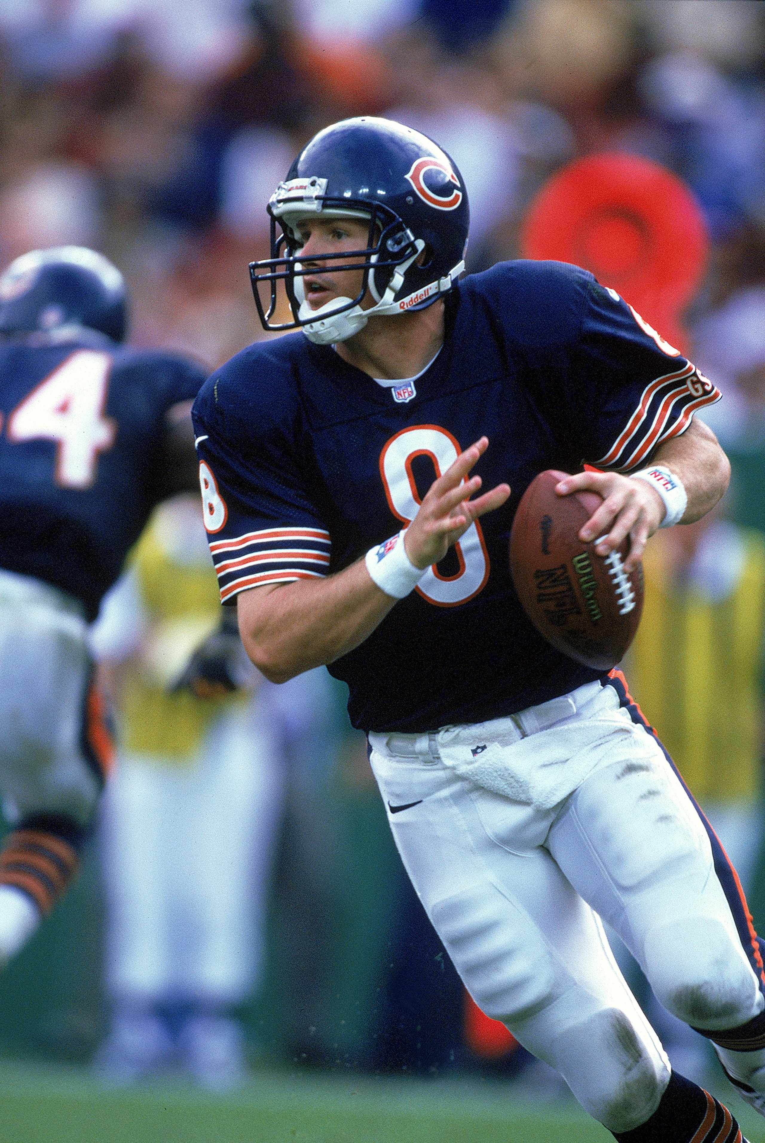 31 Oct 1999:  Cade McNown #8 of the Chicago Bears moves back to pass the ball during the game against the Washington Redskins at the Jack Kent Cooke Stadium in Washington, D.C. The Redskins defeated the Bears 48-22.. Mandatory Credit: Al Bello  /Allsport