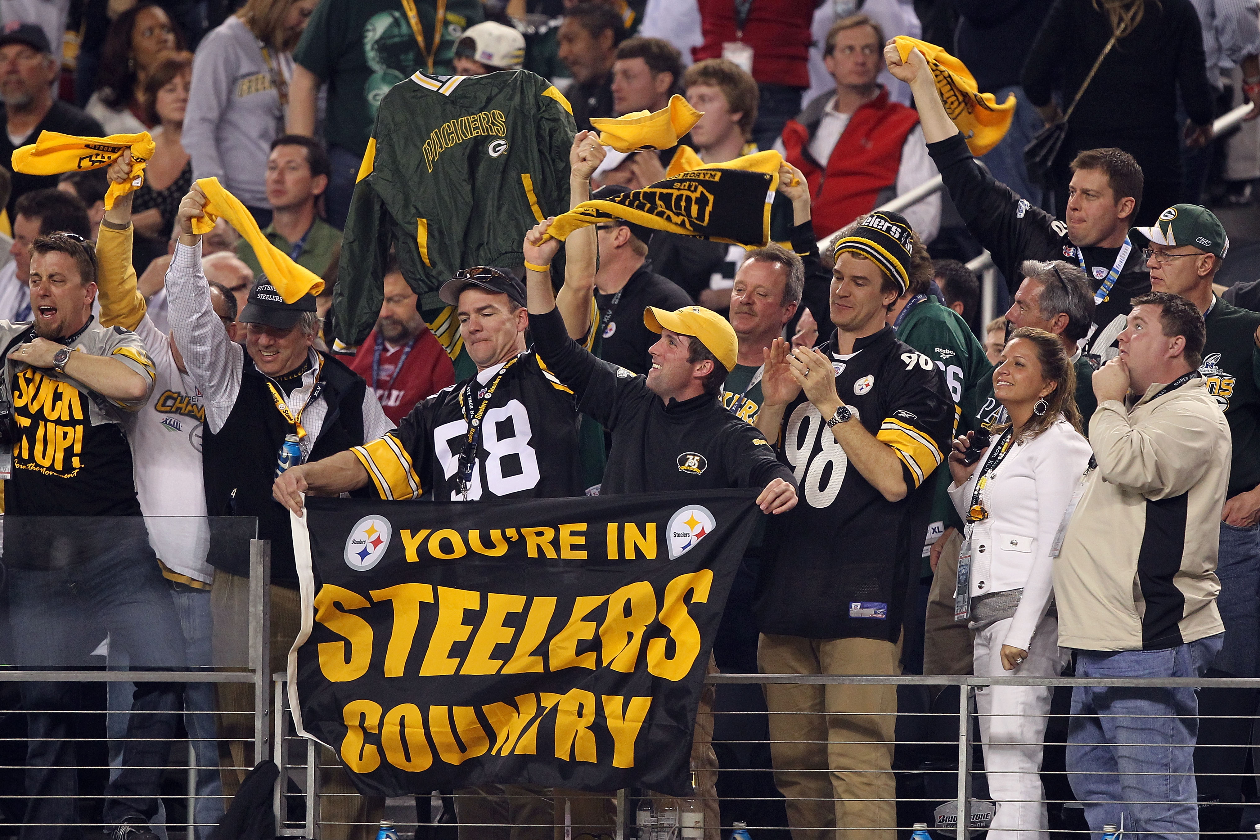 ARLINGTON, TX - FEBRUARY 06: Steelers fans celebrate in the crowd during Super Bowl XLV against the Green Bay Packers at Cowboys Stadium on February 6, 2011 in Arlington, Texas. (Photo by Al Bello/Getty Images)