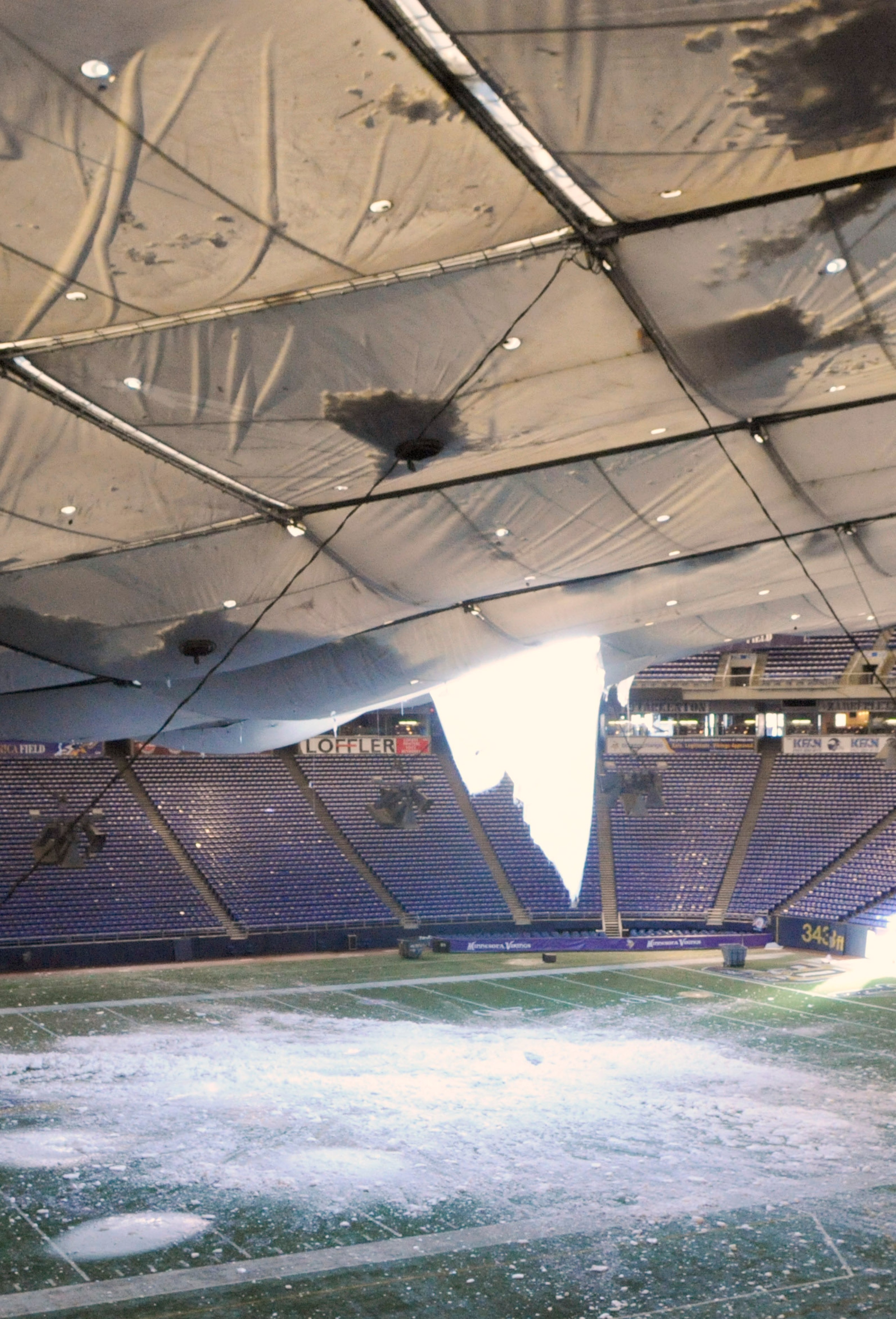 MINNEAPOLIS, MN - DECEMBER 13: A torn section of the roof sags inside the Hubert H. Humphrey Metrodome on December 13, 2010 in Minneapolis, Minnesota. The Metrodome's roof collapsed under the weight of snow after a powerful blizzard hit the area on Decemb MINNEAPOLIS, MN - DECEMBER 13: A torn section of the roof sags inside the Hubert H. Humphrey Metrodome on December 13, 2010 in Minneapolis, Minnesota. The Metrodome's roof collapsed under the weight of snow after a powerful blizzard hit the area on Decemb