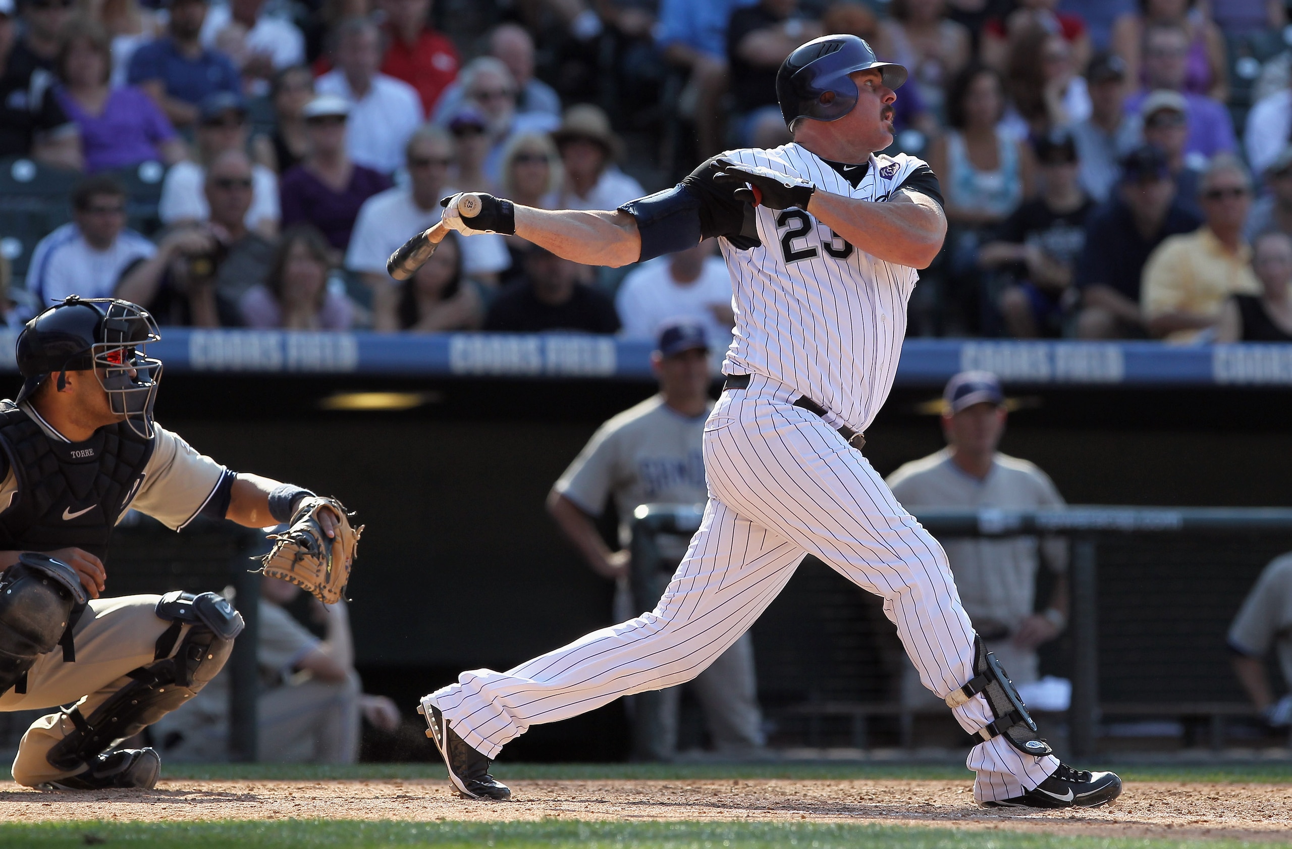 DENVER - SEPTEMBER 15:  Jason Giambi #23 of the Colorado Rockies takes an at bat against the San Diego Padres at Coors Field on September 15, 2010 in Denver, Colorado. The Rockies defeated the Padres 9-6.  (Photo by Doug Pensinger/Getty Images)