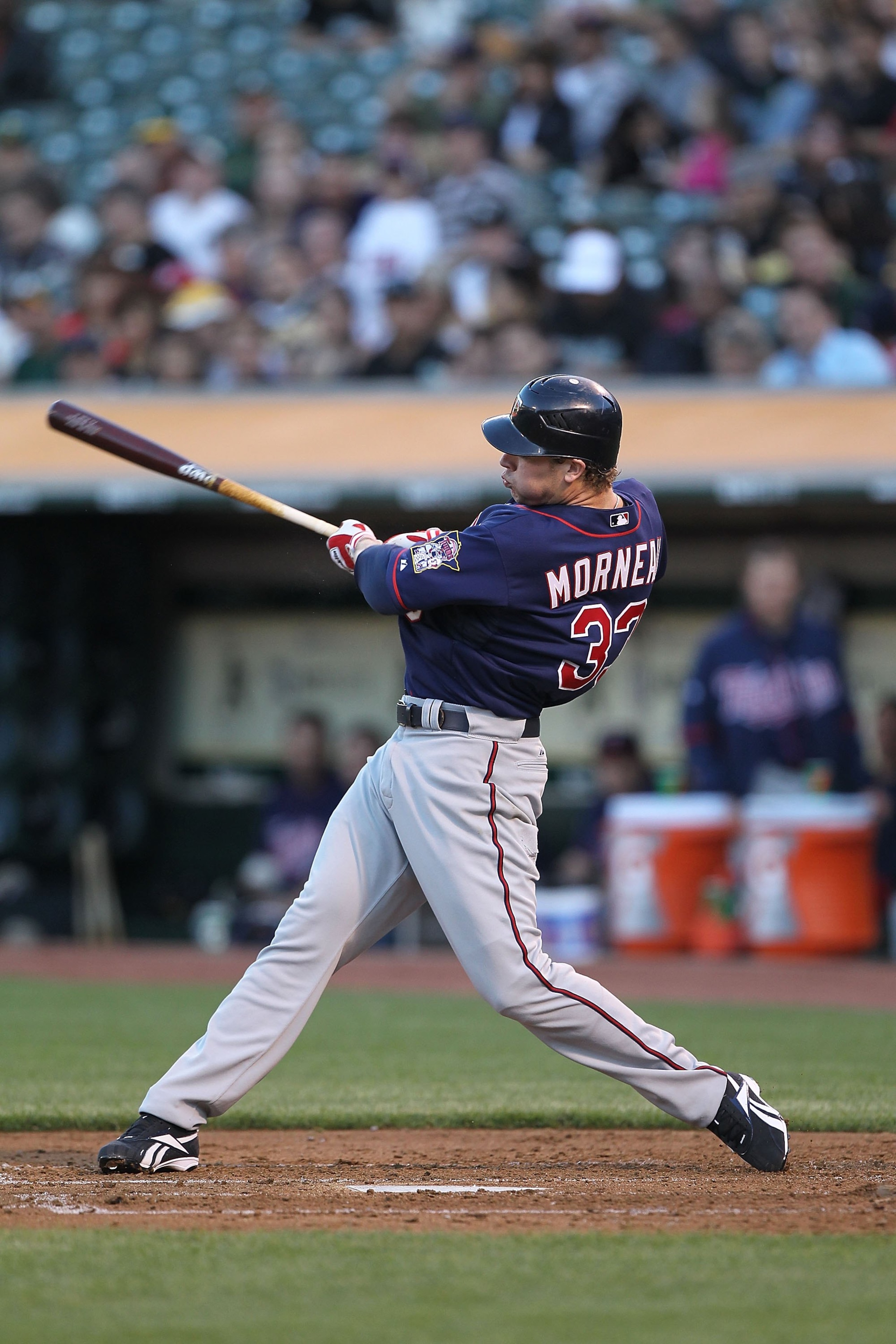 OAKLAND, CA - JUNE 04: Justin Morneau #33 of the Minnesota Twins bats against the Oakland Athletics during an MLB game at the Oakland-Alameda County Coliseum on June 4, 2010 in Oakland, California. (Photo by Jed Jacobsohn/Getty Images) OAKLAND, CA - JUNE 04: Justin Morneau #33 of the Minnesota Twins bats against the Oakland Athletics during an MLB game at the Oakland-Alameda County Coliseum on June 4, 2010 in Oakland, California. (Photo by Jed Jacobsohn/Getty Images)