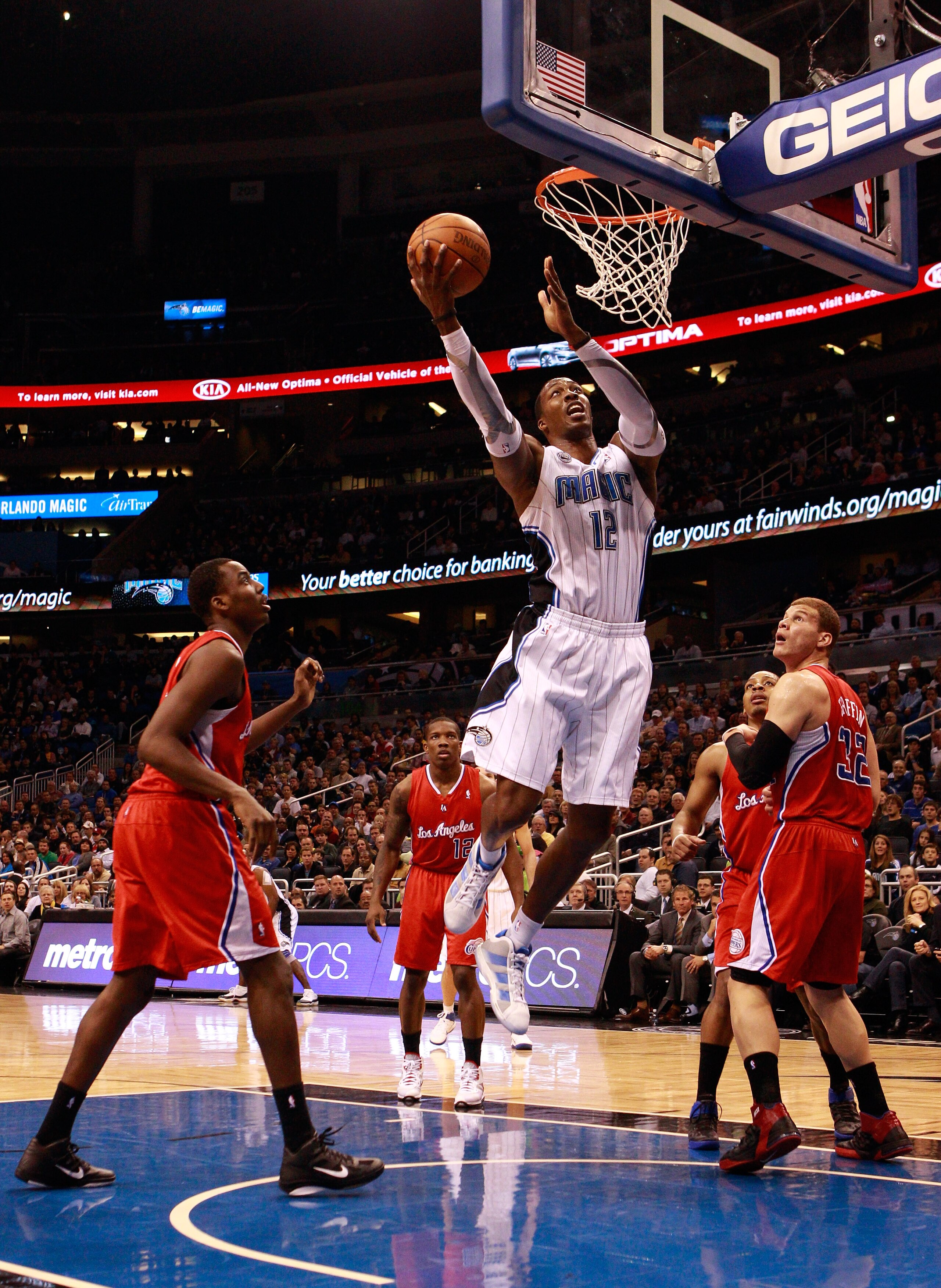 ORLANDO, FL - FEBRUARY 08:  Dwight Howard #12 of the Orlando Magic attempts a shot during a game against the Los Angeles Clippers at Amway Arena on February 8, 2011 in Orlando, Florida.  NOTE TO USER: User expressly acknowledges and agrees that, by downlo