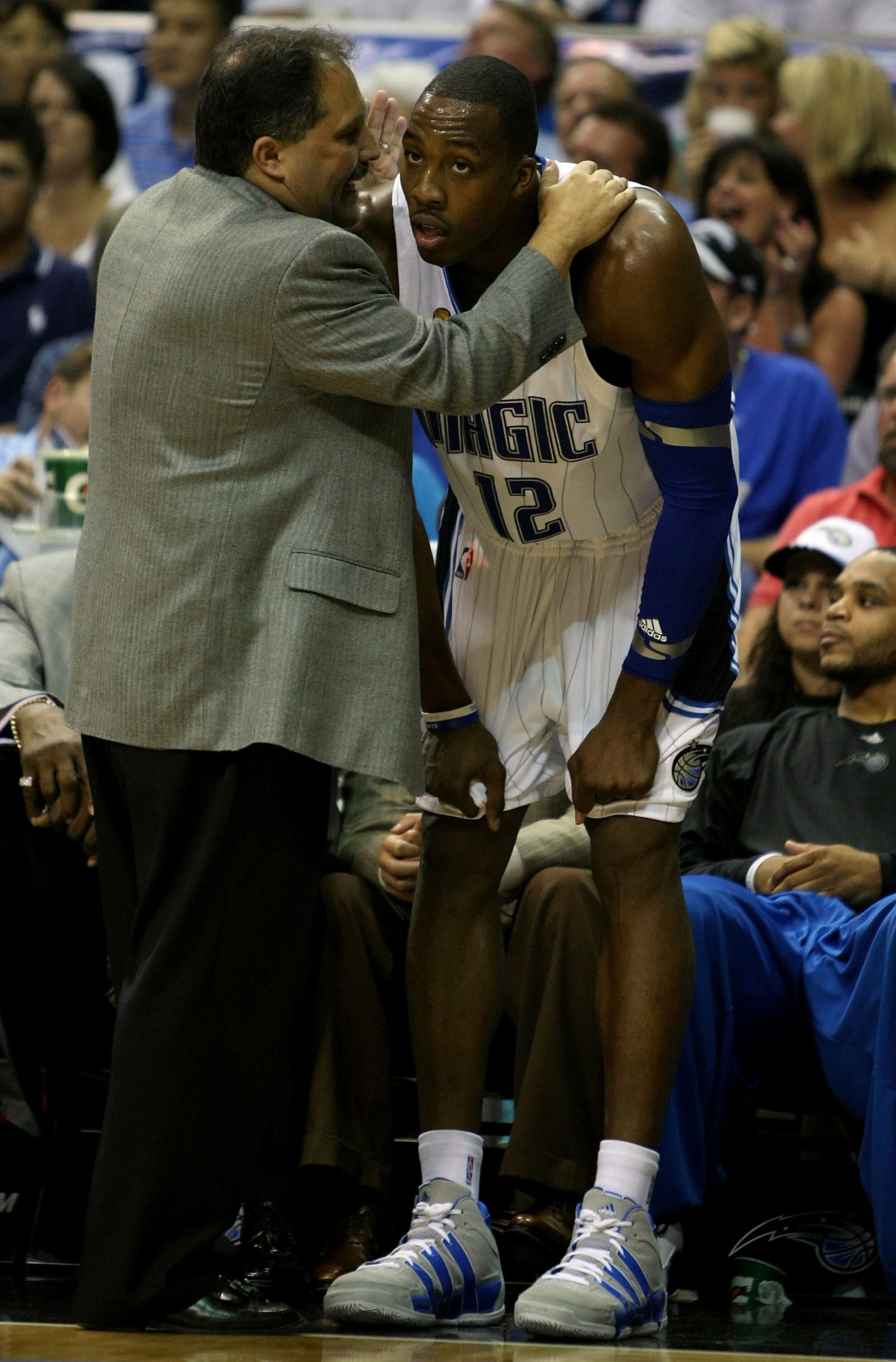 ORLANDO, FL - JUNE 14:  Head coach Stan Van Gundy talks to Dwight Howard #12 of the Orlando Magic near the side line in the second half against the Los Angeles Lakers in Game Five of the 2009 NBA Finals on June 14, 2009 at Amway Arena in Orlando, Florida.
