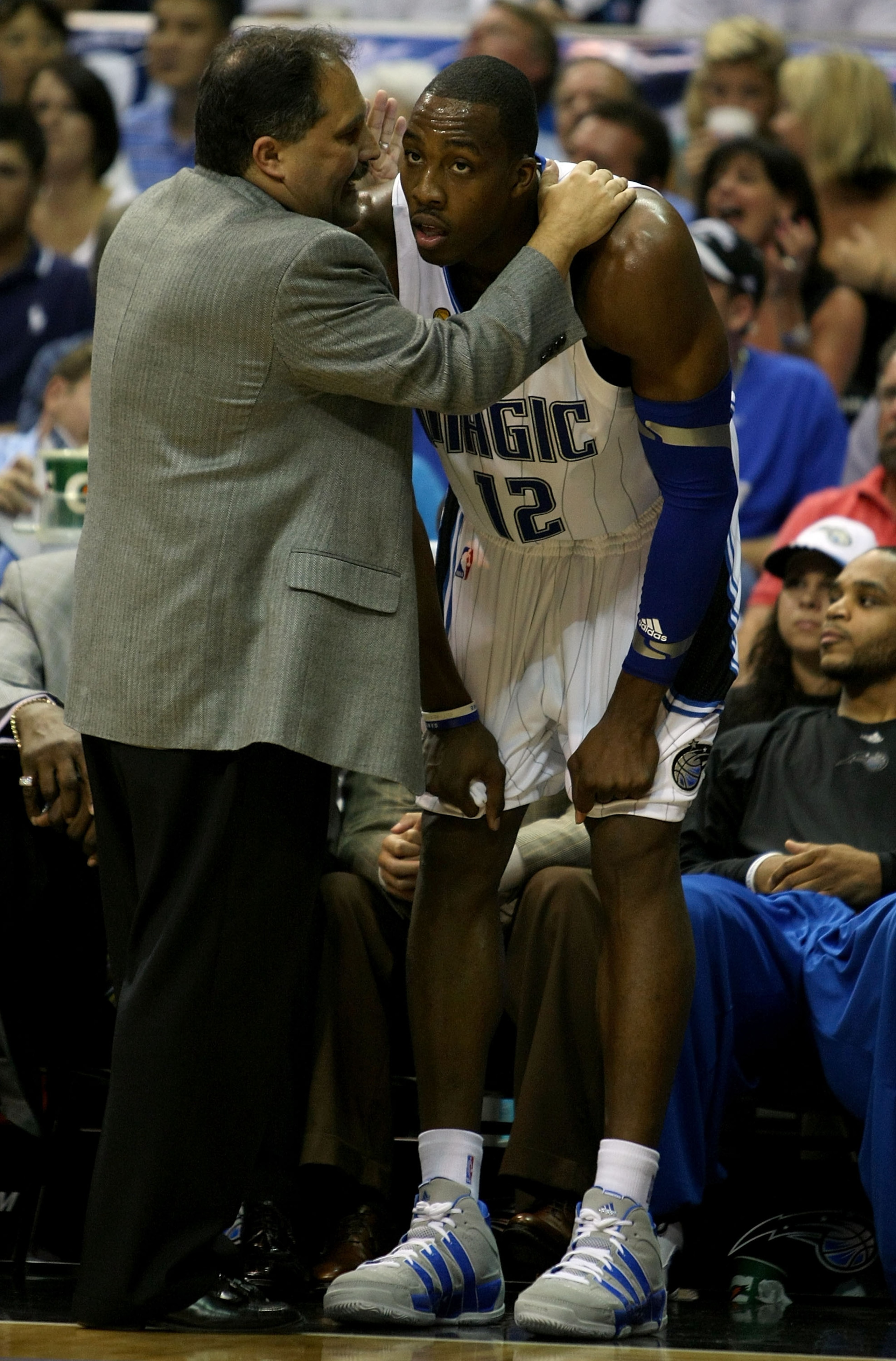 ORLANDO, FL - JUNE 14:  Head coach Stan Van Gundy talks to Dwight Howard #12 of the Orlando Magic near the side line in the second half against the Los Angeles Lakers in Game Five of the 2009 NBA Finals on June 14, 2009 at Amway Arena in Orlando, Florida.