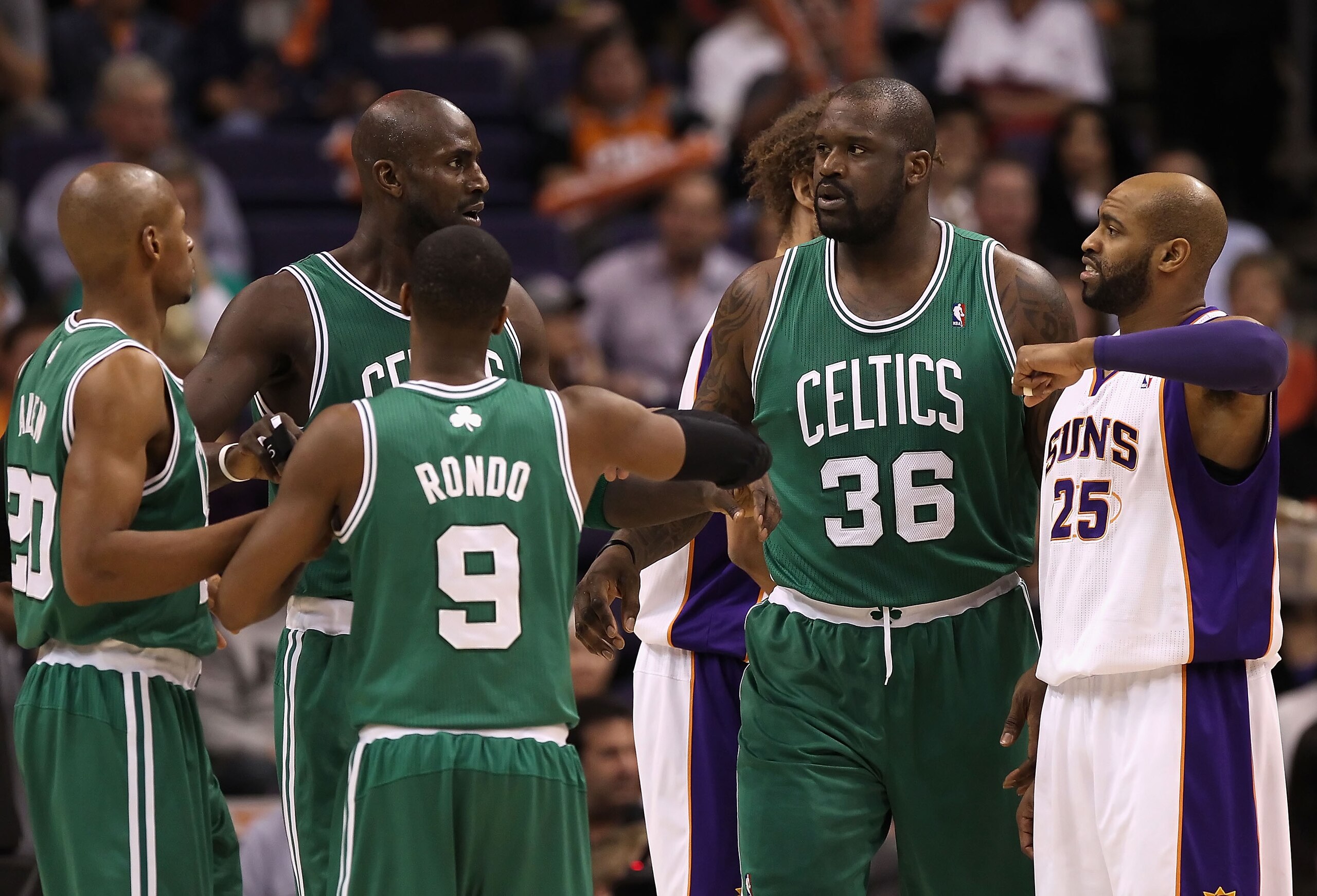 PHOENIX, AZ - JANUARY 28:  (L-R) Paul Pierce #34, Kevin Garnett #5, Rajon Rondo #9 and Shaquille O'Neal #36 of the Boston Celtics during the NBA game against the Phoenix Suns at US Airways Center on January 28, 2011 in Phoenix, Arizona.  The Suns defeated
