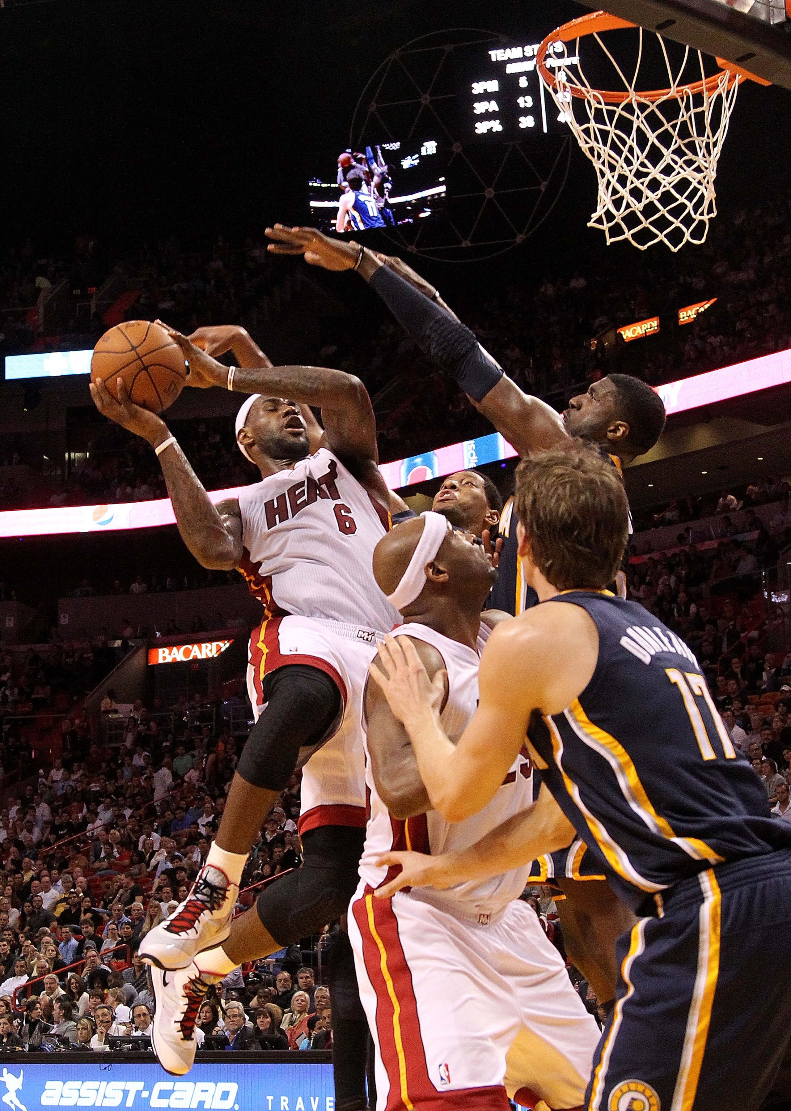 MIAMI, FL - FEBRUARY 08:  LeBron James #6 of the Miami Heat shoots over Roy Hibbert #55 of the Indiana Pacers during a game at American Airlines Arena on February 8, 2011 in Miami, Florida. NOTE TO USER: User expressly acknowledges and agrees that, by dow