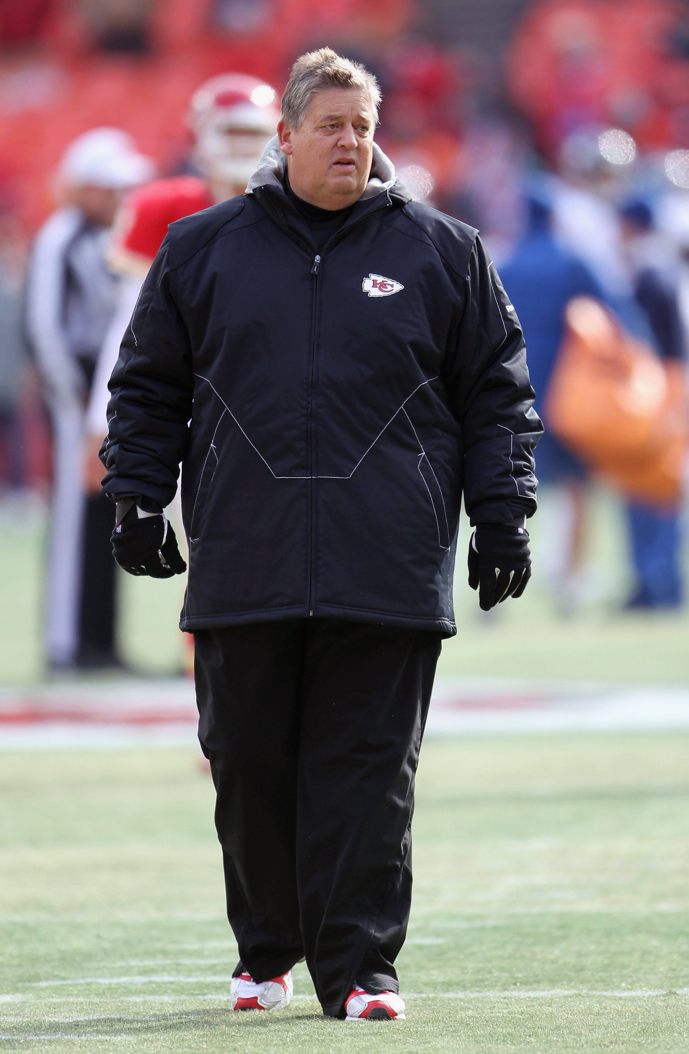 KANSAS CITY, MO - DECEMBER 05:  Offensive coordinator Charlie Weis of the Kansas City Chiefs walks on the field prior to the game against the Denver Broncos on December 5, 2010 at Arrowhead Stadium in Kansas City, Missouri.  (Photo by Jamie Squire/Getty I