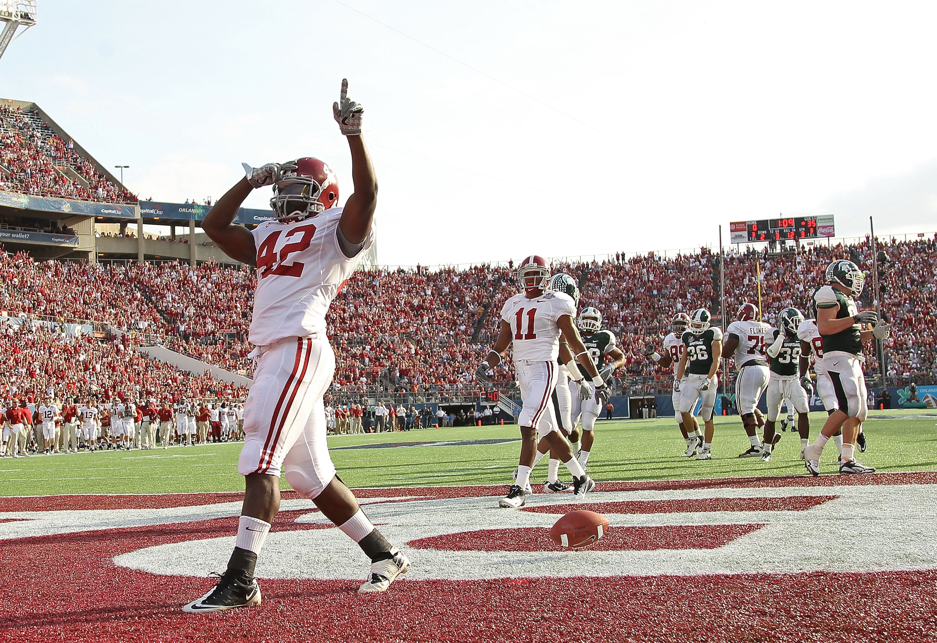 ORLANDO, FL - JANUARY 01: Eddie Lacy #42 of the Alabama Crimson Tide celebrates after rushing for a touchdown during the Capitol One Bowl against the Michigan State Spartans at the Florida Citrus Bowl on January 1, 2011 in Orlando, Florida. (Photo by Mi ORLANDO, FL - JANUARY 01: Eddie Lacy #42 of the Alabama Crimson Tide celebrates after rushing for a touchdown during the Capitol One Bowl against the Michigan State Spartans at the Florida Citrus Bowl on January 1, 2011 in Orlando, Florida. (Photo by Mi