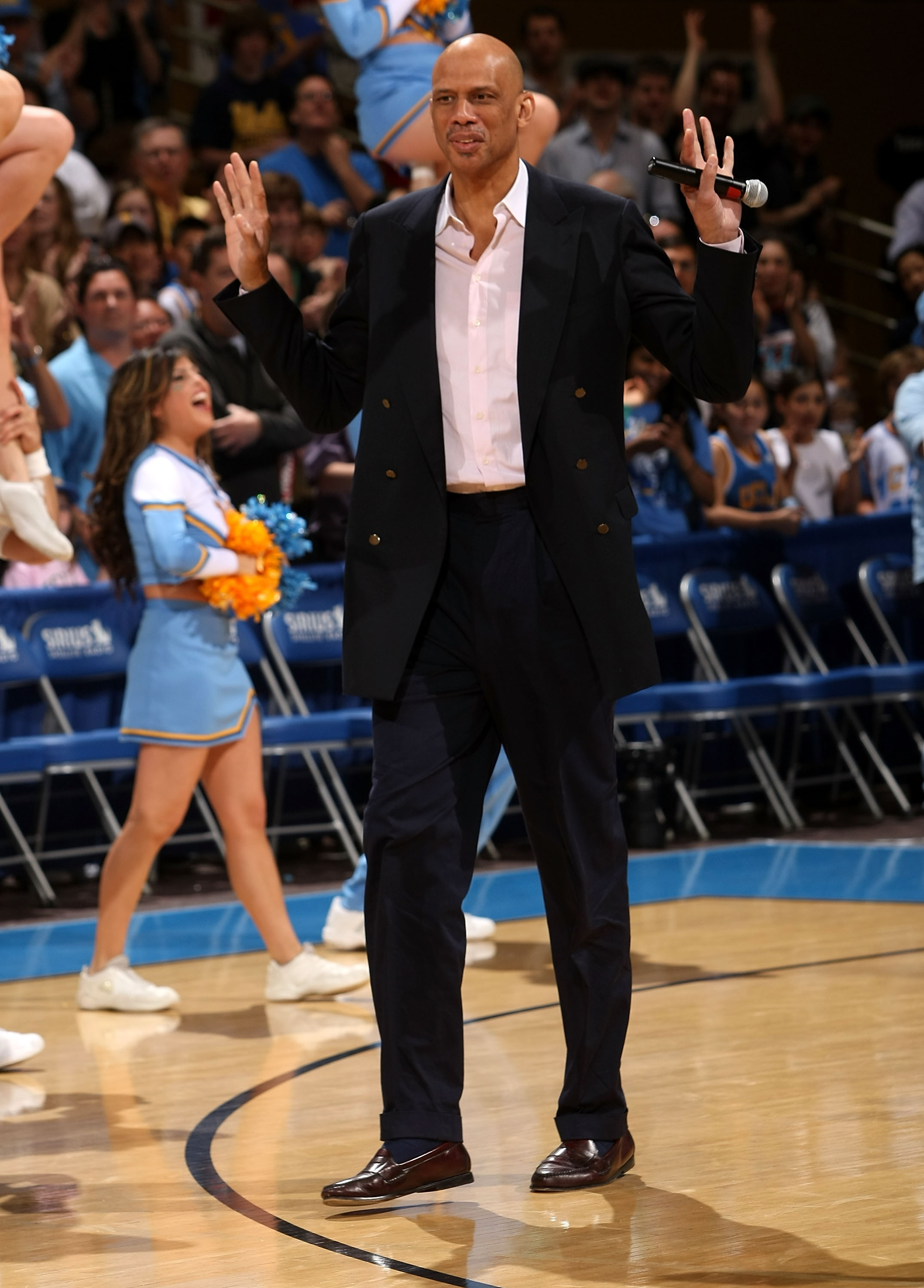 WESTWOOD, CA - MARCH 08: Former player Kareem Abdul Jabar of the UCLA Bruins waves to the crowd during ceremonies honoring his 1967-68 NCAA championship team at halftime of the game with the California Golden Bears on March 8, 2008 at Pauley Pavillion in 