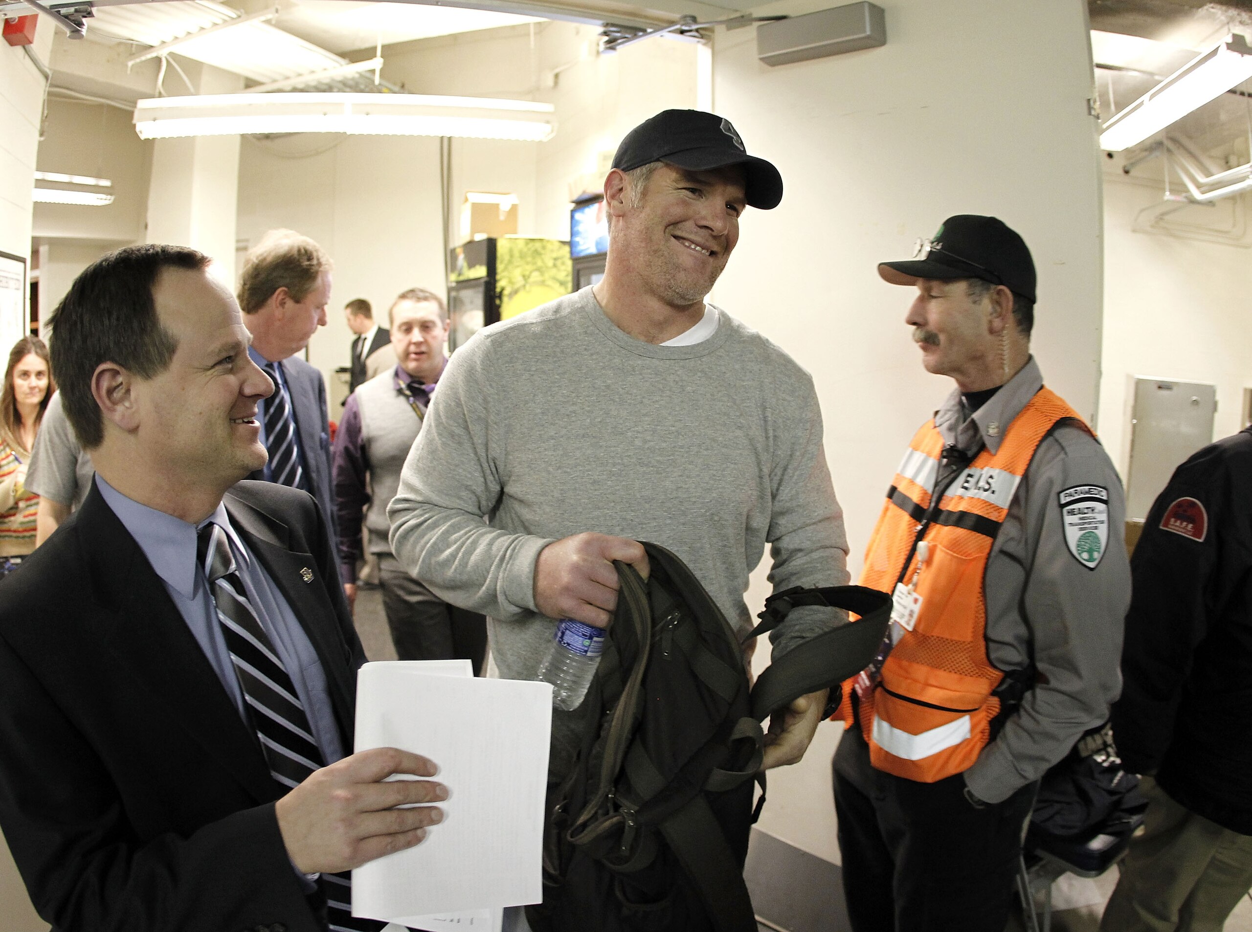 DETROIT, MI - JANUARY 02:  Brett Favre #4 of the Minnesota Vikings heads to a post game press conference after a 13-20 loss to the Detroit Lions at Ford Field on January 2, 2011 in Detroit, Michigan.  (Photo by Gregory Shamus/Getty Images)